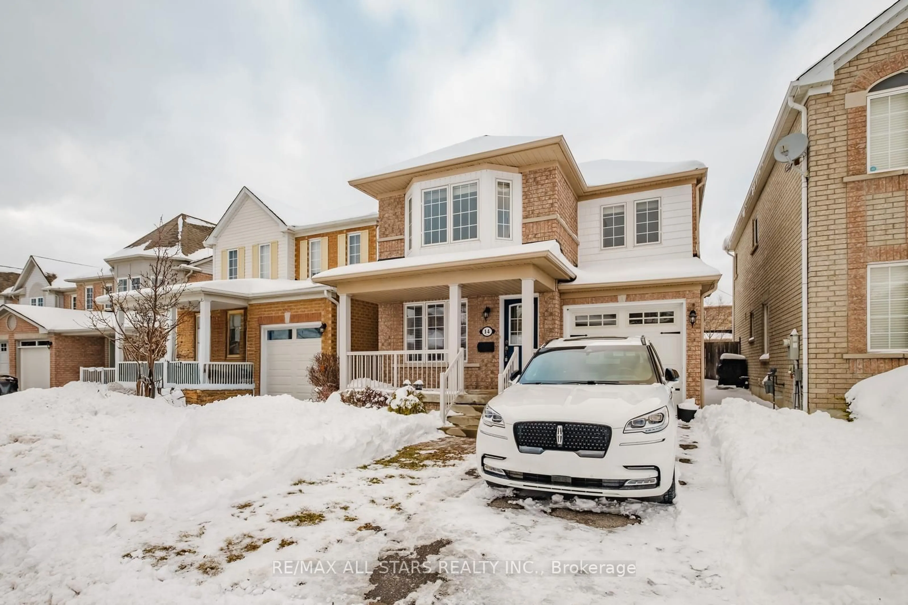 Home with brick exterior material, street for 14 Bloomsbury Rd, Markham Ontario L6E 1R9