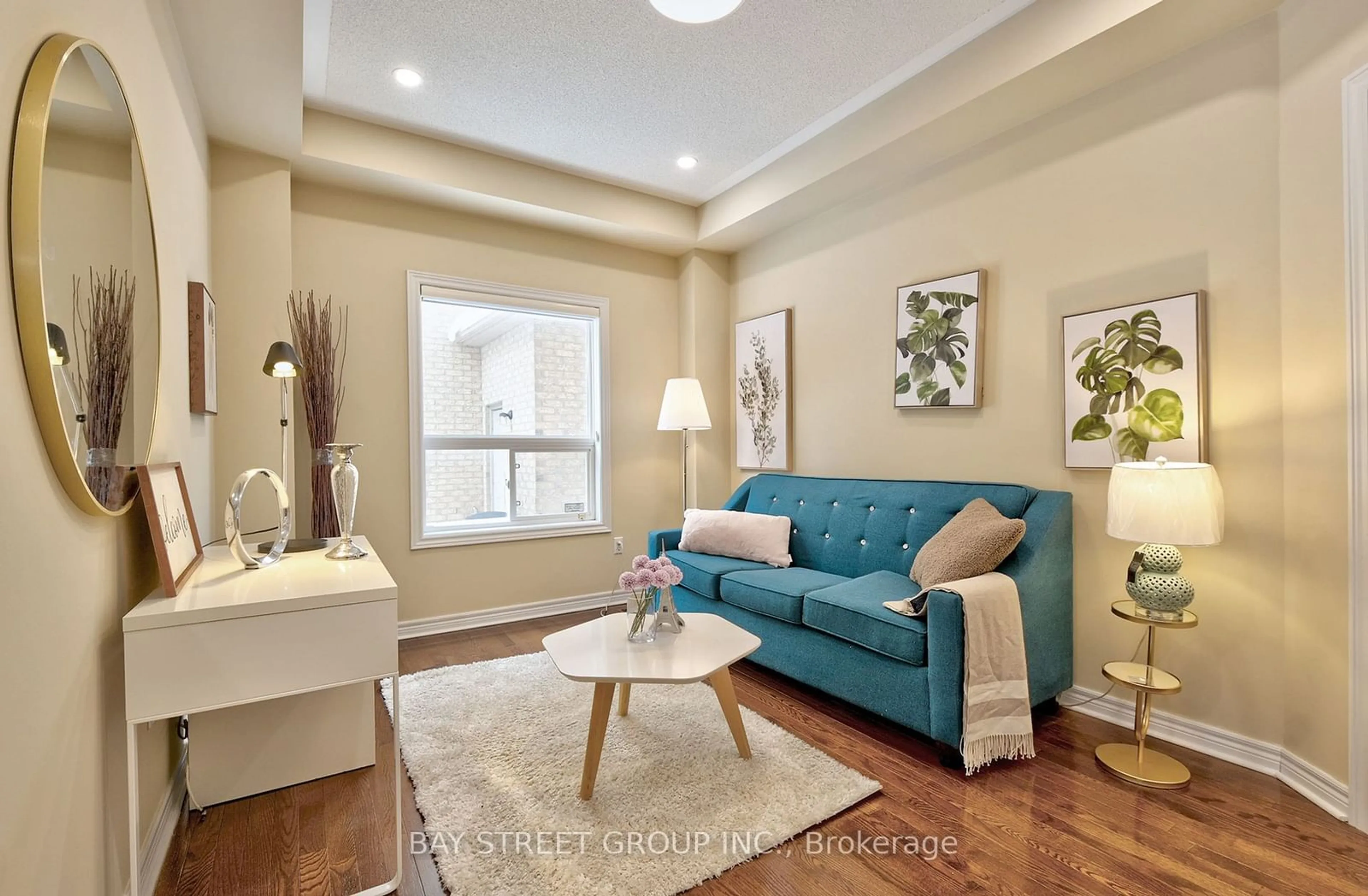 Living room with furniture, wood/laminate floor for 43 English Oak Dr, Richmond Hill Ontario L4E 3W2