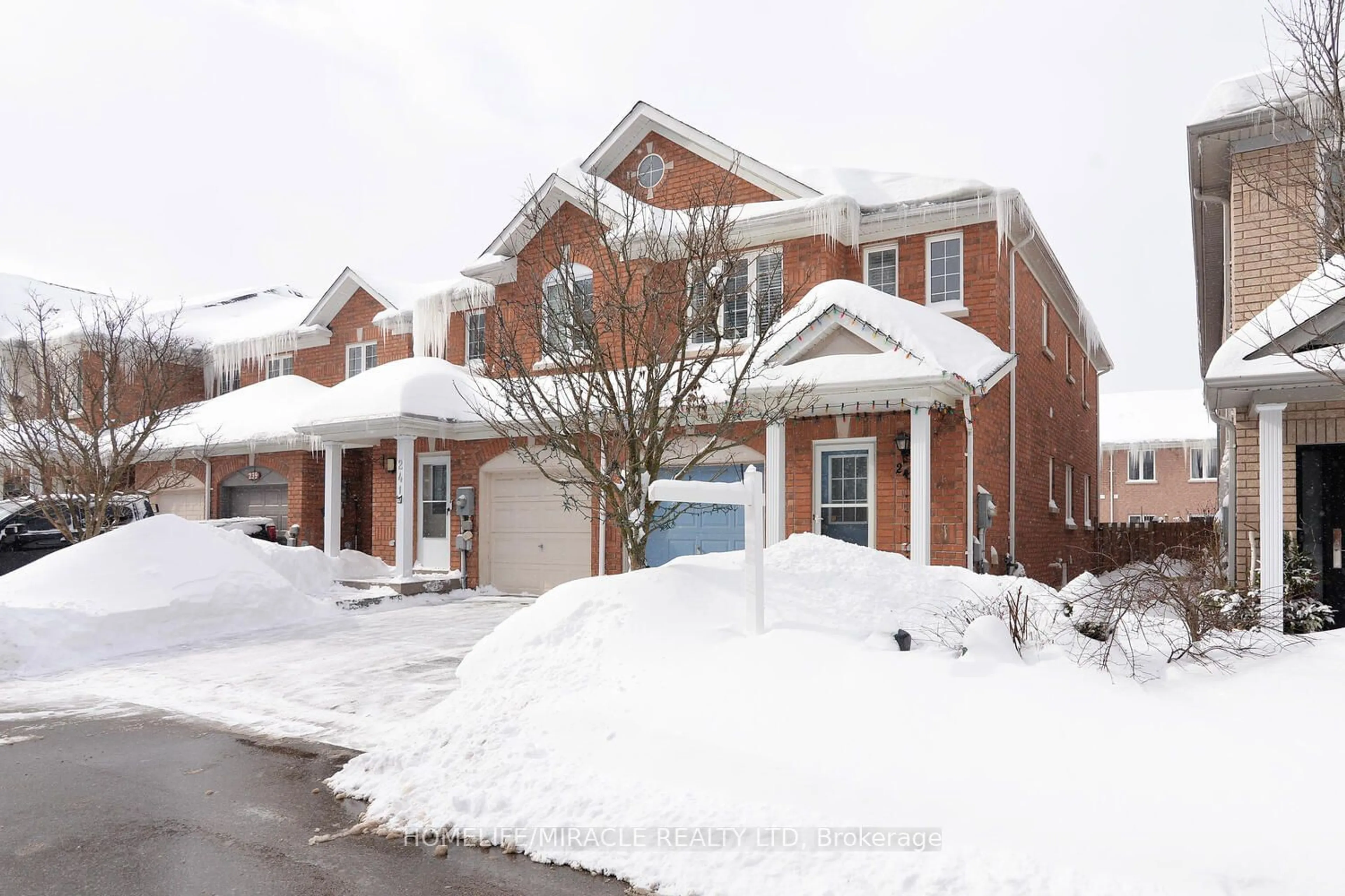 Home with brick exterior material, street for 243 Tom Taylor Cres, Newmarket Ontario L3X 3E9