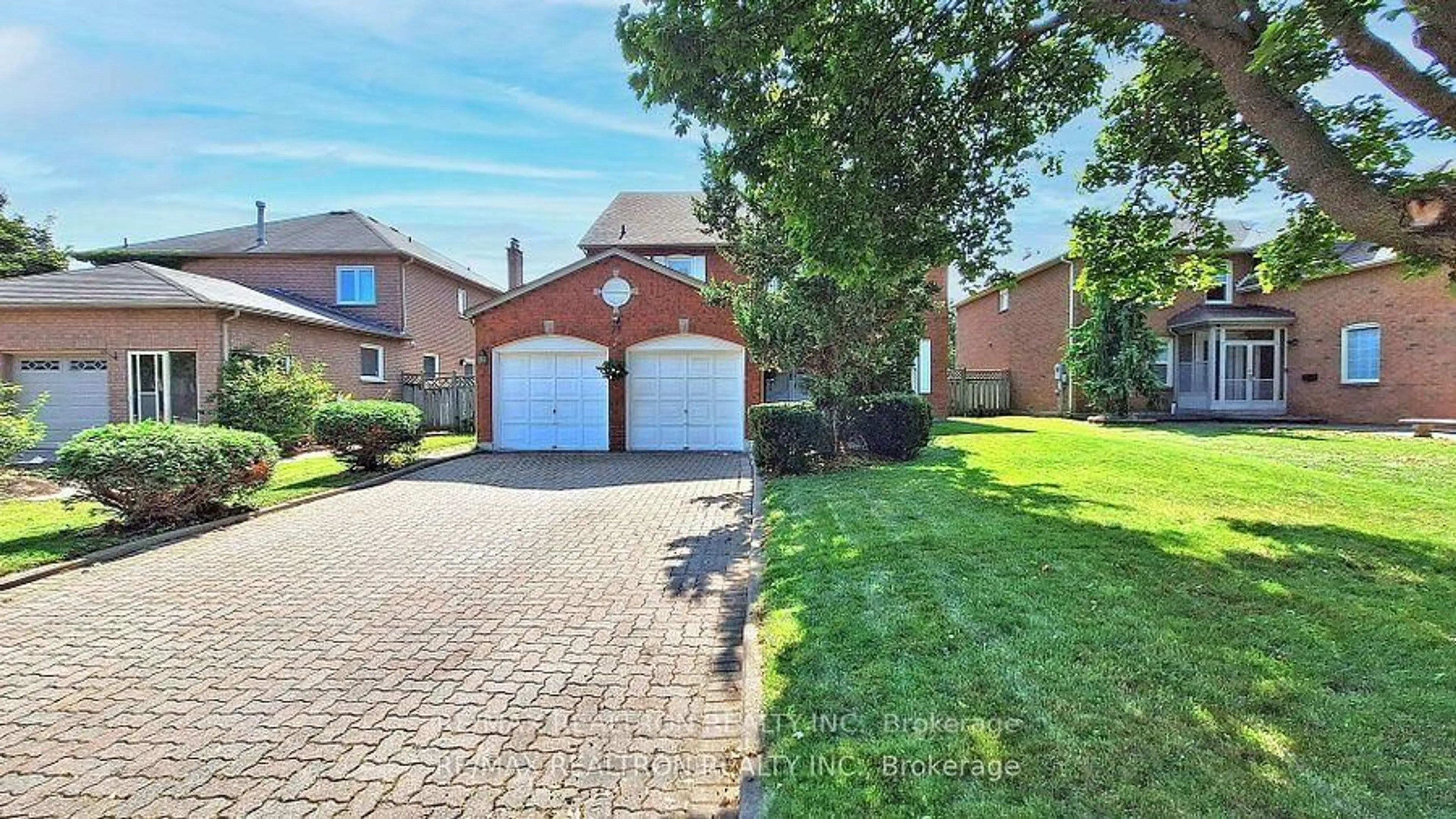 Home with brick exterior material, street for 72 Spanhouse Cres, Markham Ontario L3R 4E3