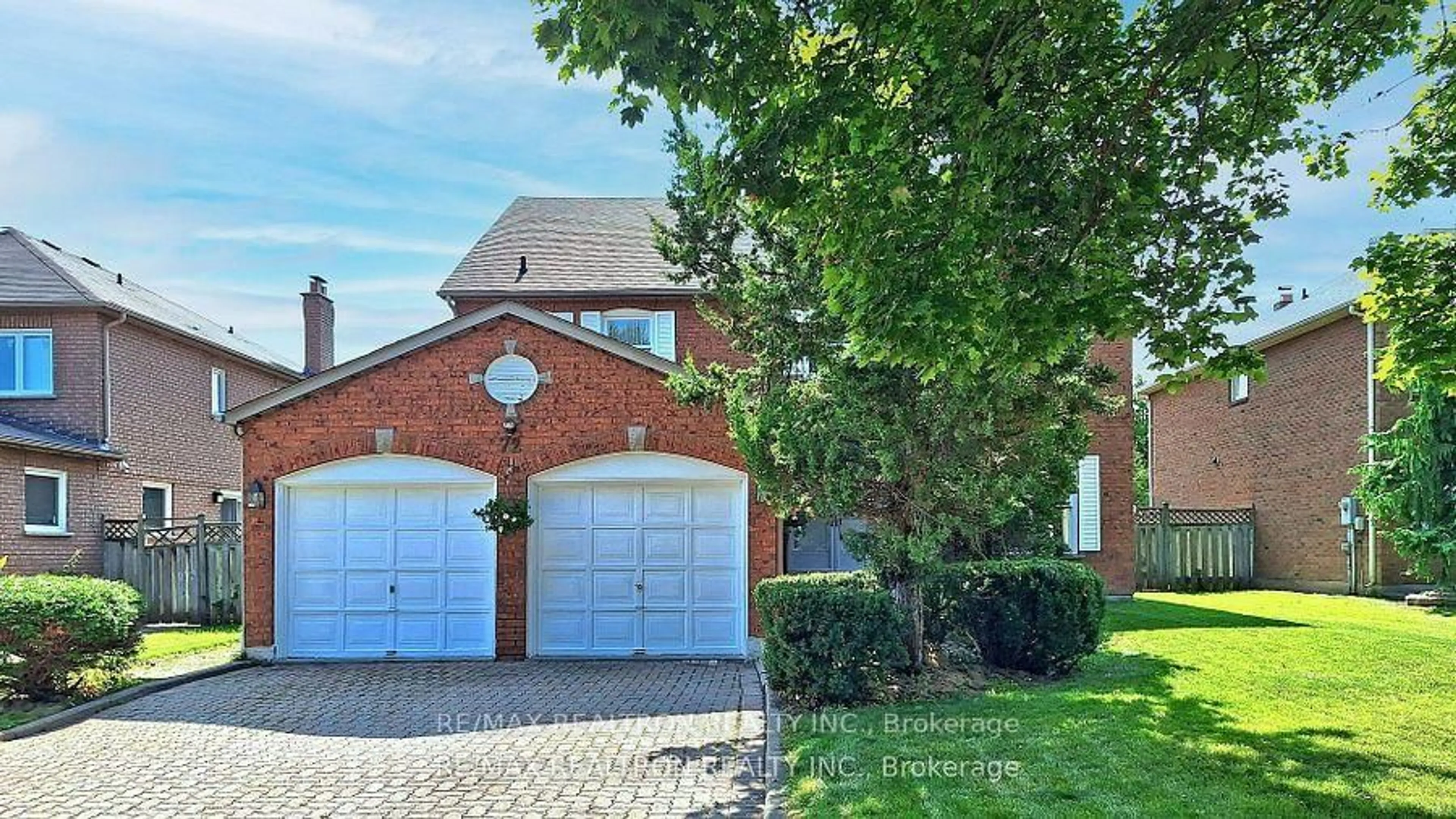 Home with brick exterior material, street for 72 Spanhouse Cres, Markham Ontario L3R 4E3