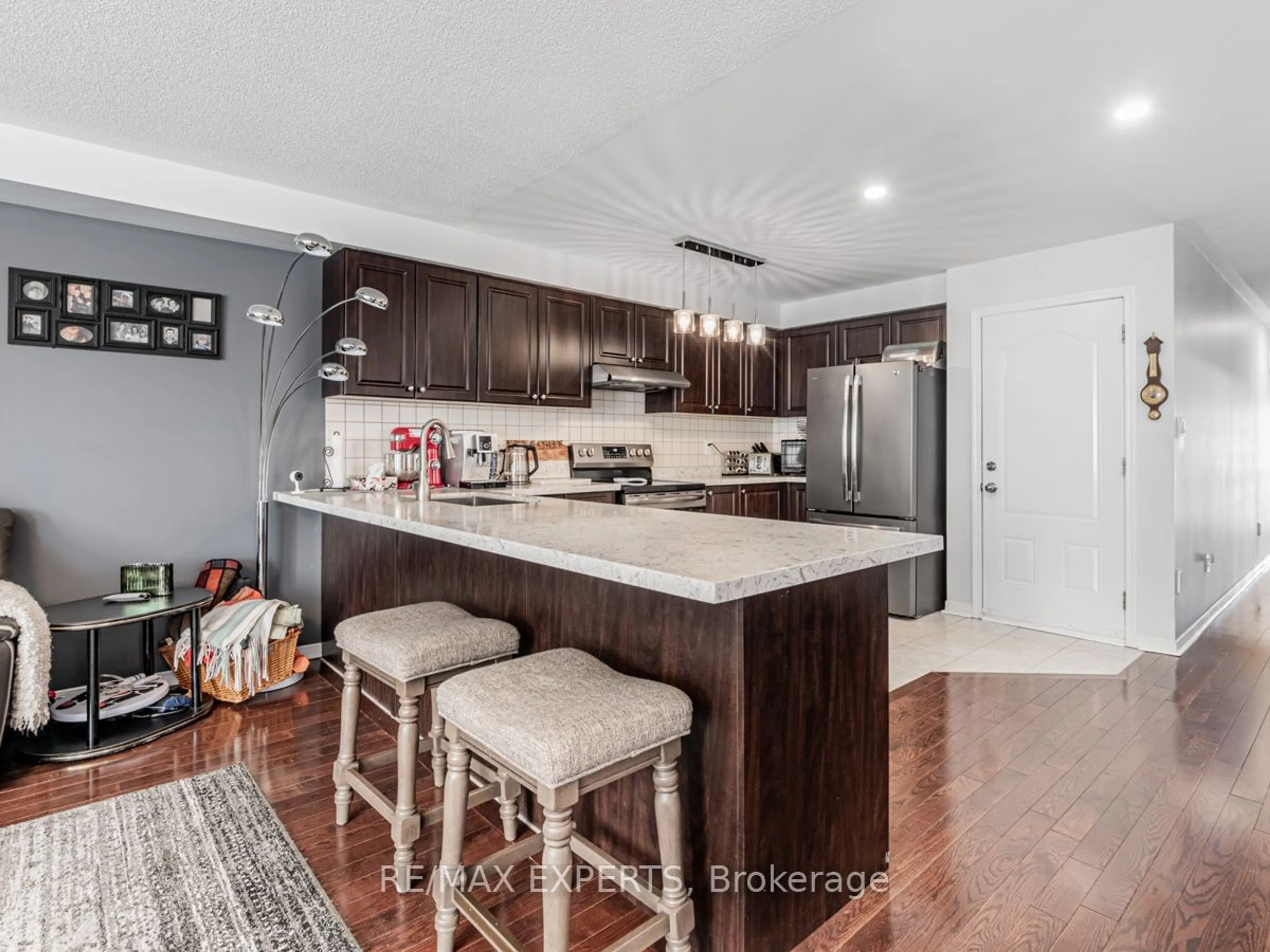 Open concept kitchen, wood/laminate floor for 55 Coranto Way, Vaughan Ontario L4H 3L9