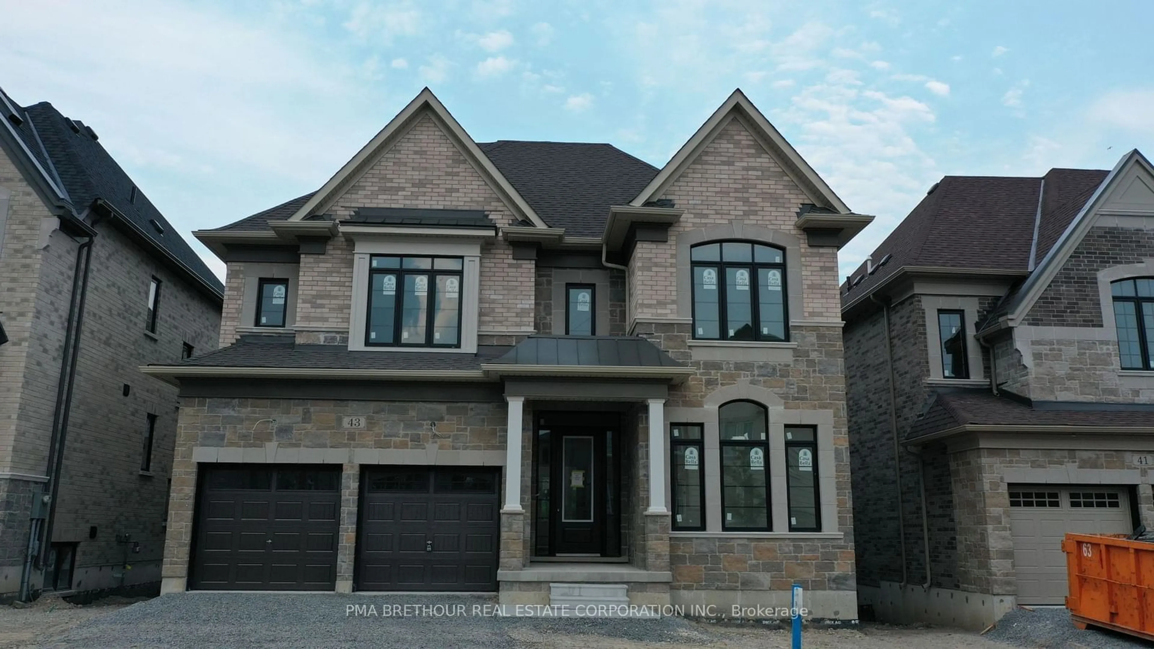 Home with brick exterior material, street for 43 Bush Ridge Ave, Richmond Hill Ontario L4E 0P1