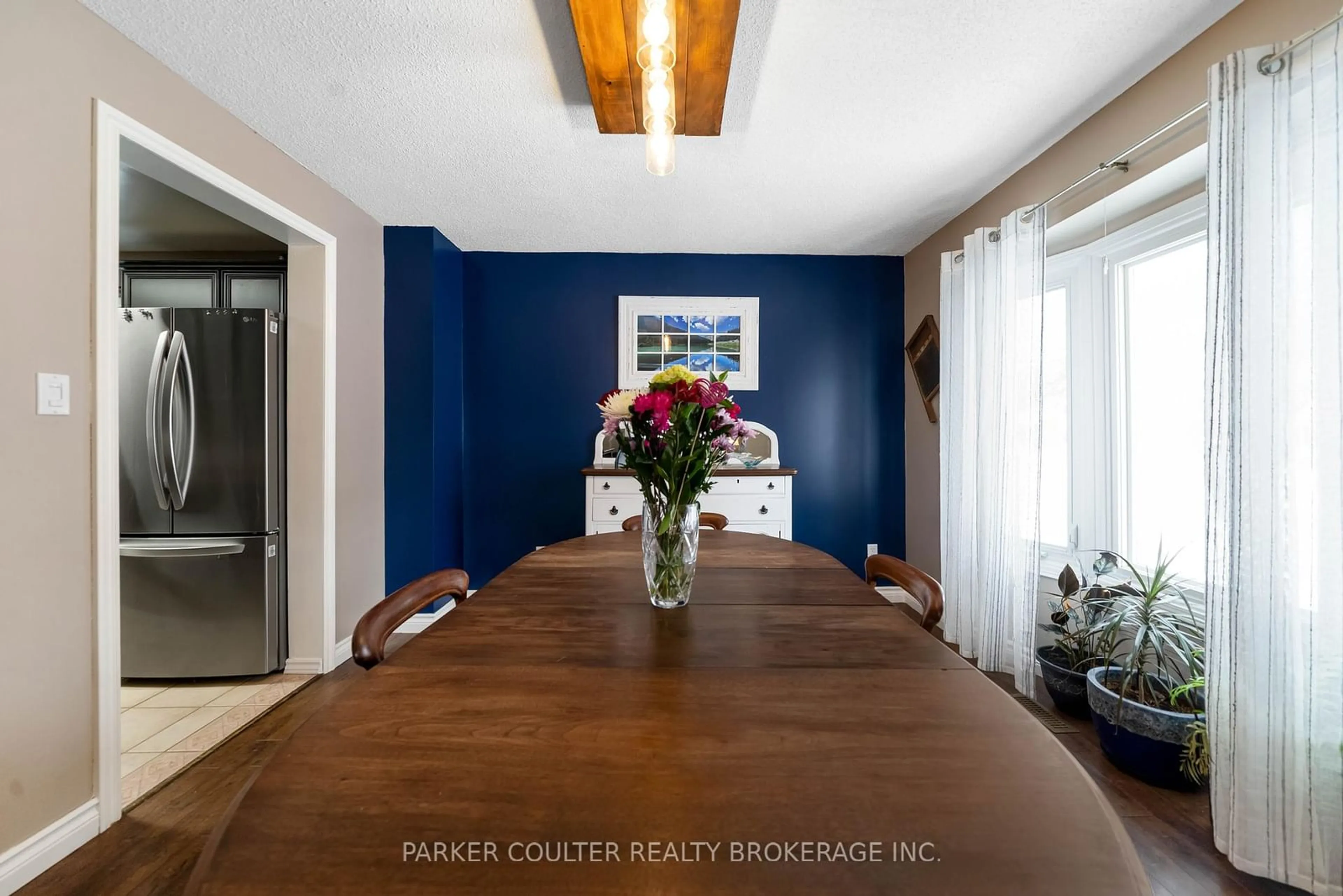 Dining room, wood/laminate floor for 698 Candaras St, Innisfil Ontario L9S 2G9