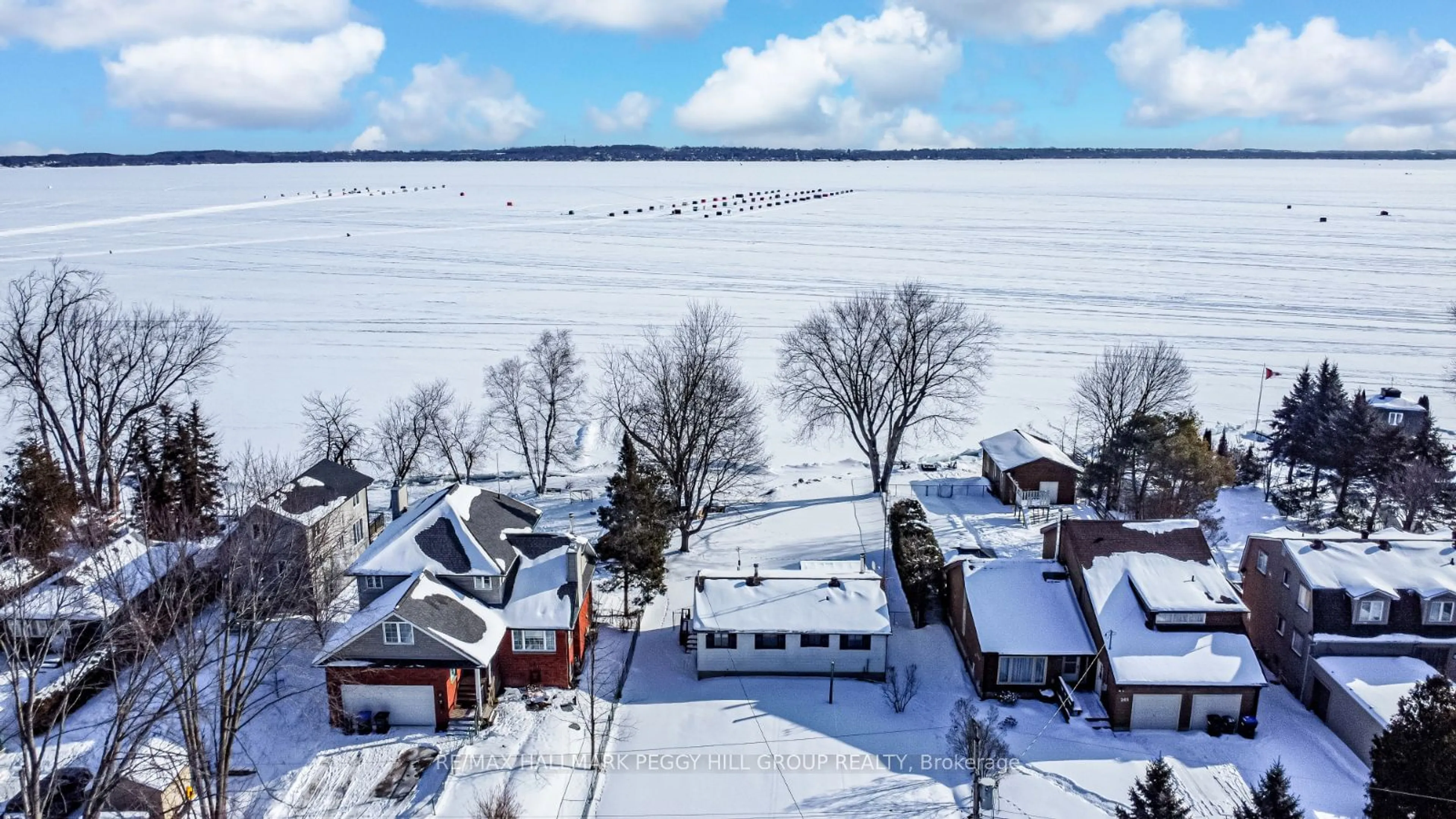 A pic from outside/outdoor area/front of a property/back of a property/a pic from drone, water/lake/river/ocean view for 253 Bayshore Rd, Innisfil Ontario L0L 1K0