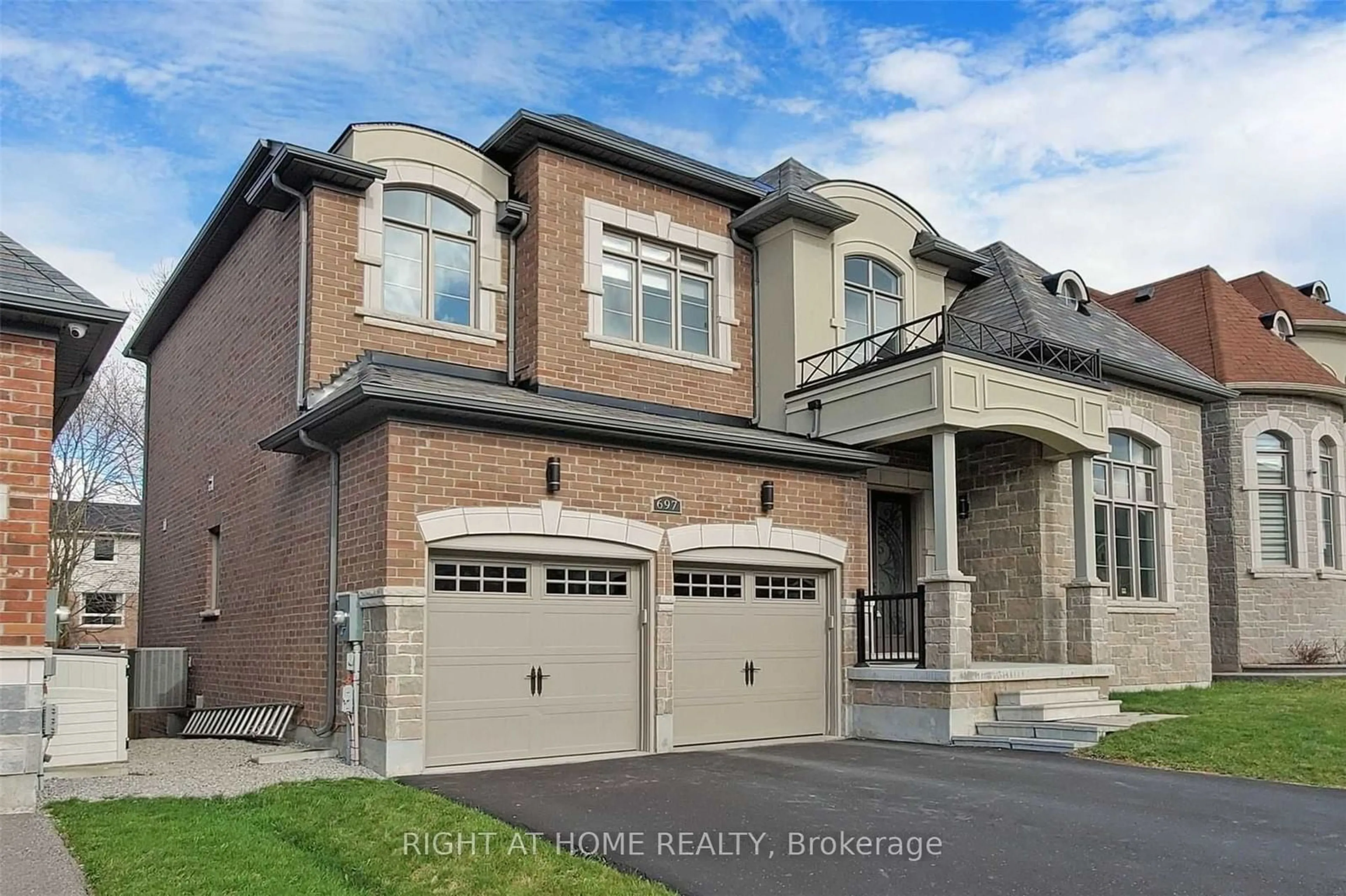 Home with brick exterior material, street for 697 Mcgregor Farm Tr, Newmarket Ontario L3X 0H3