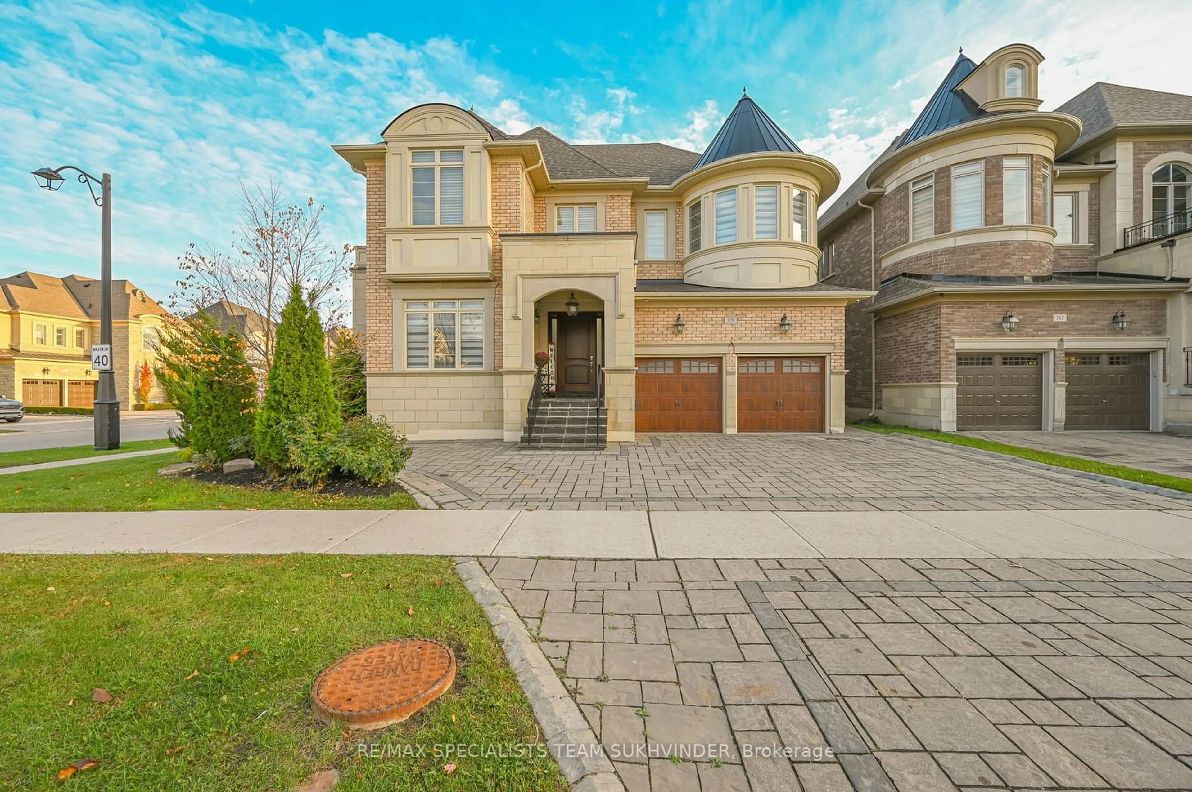 Home with brick exterior material, street for 378 Woodgate Pines Dr, Vaughan Ontario L4H 3N5