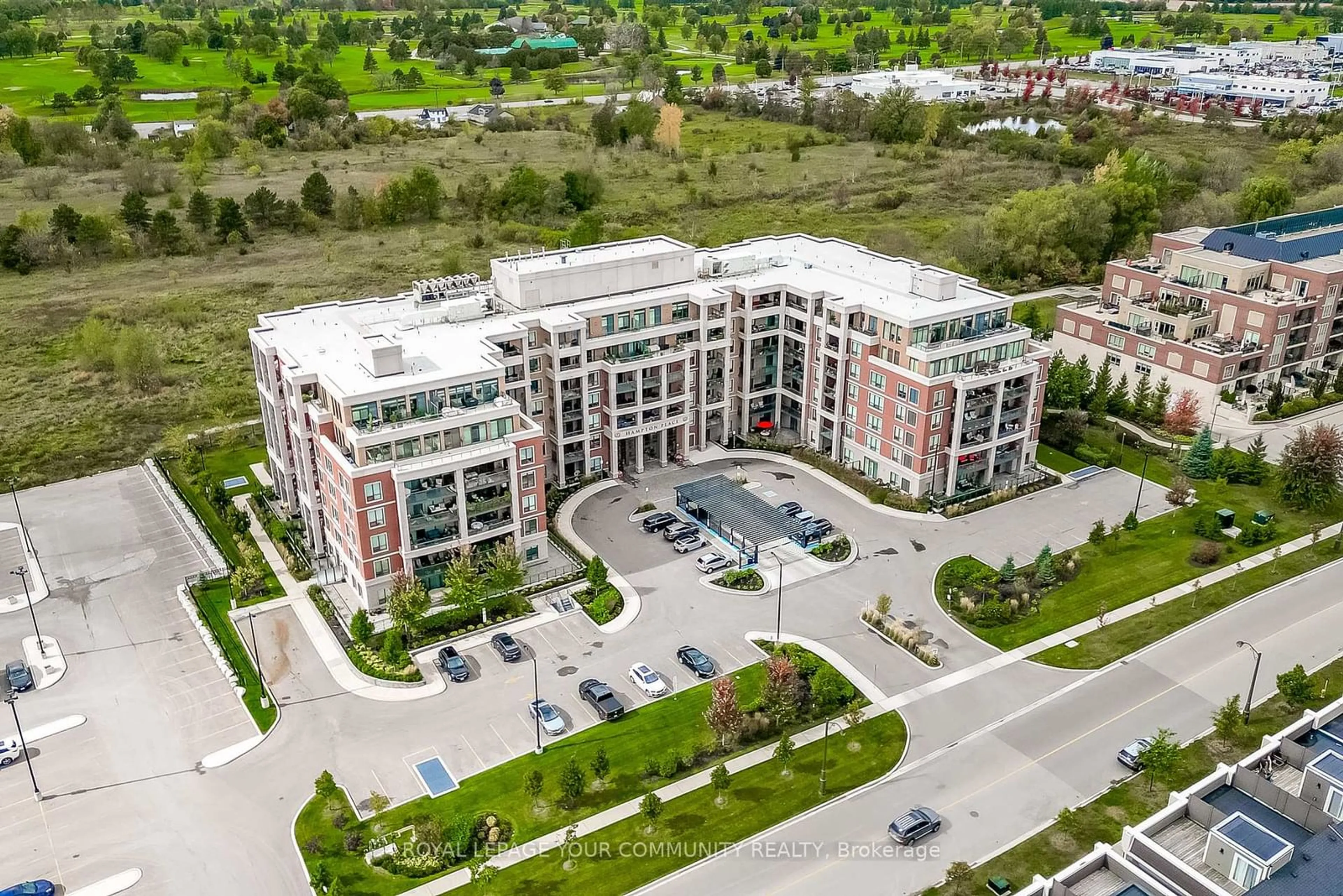 A pic from outside/outdoor area/front of a property/back of a property/a pic from drone, building for 25 Baker Hill Blvd #409, Whitchurch-Stouffville Ontario L4A 4R5