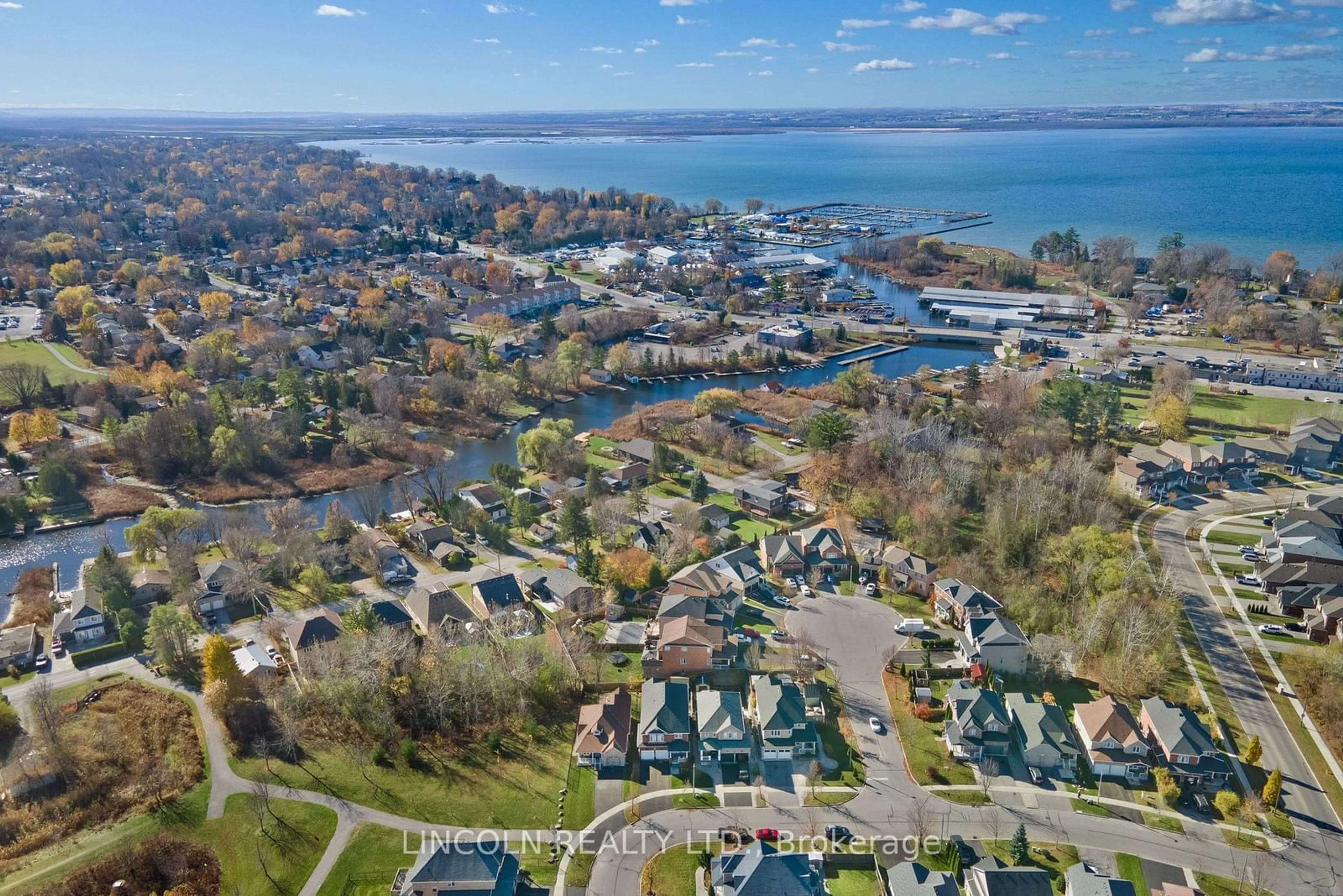 A pic from outside/outdoor area/front of a property/back of a property/a pic from drone, water/lake/river/ocean view for 18 Glendower Cres, Georgina Ontario L4P 0A5