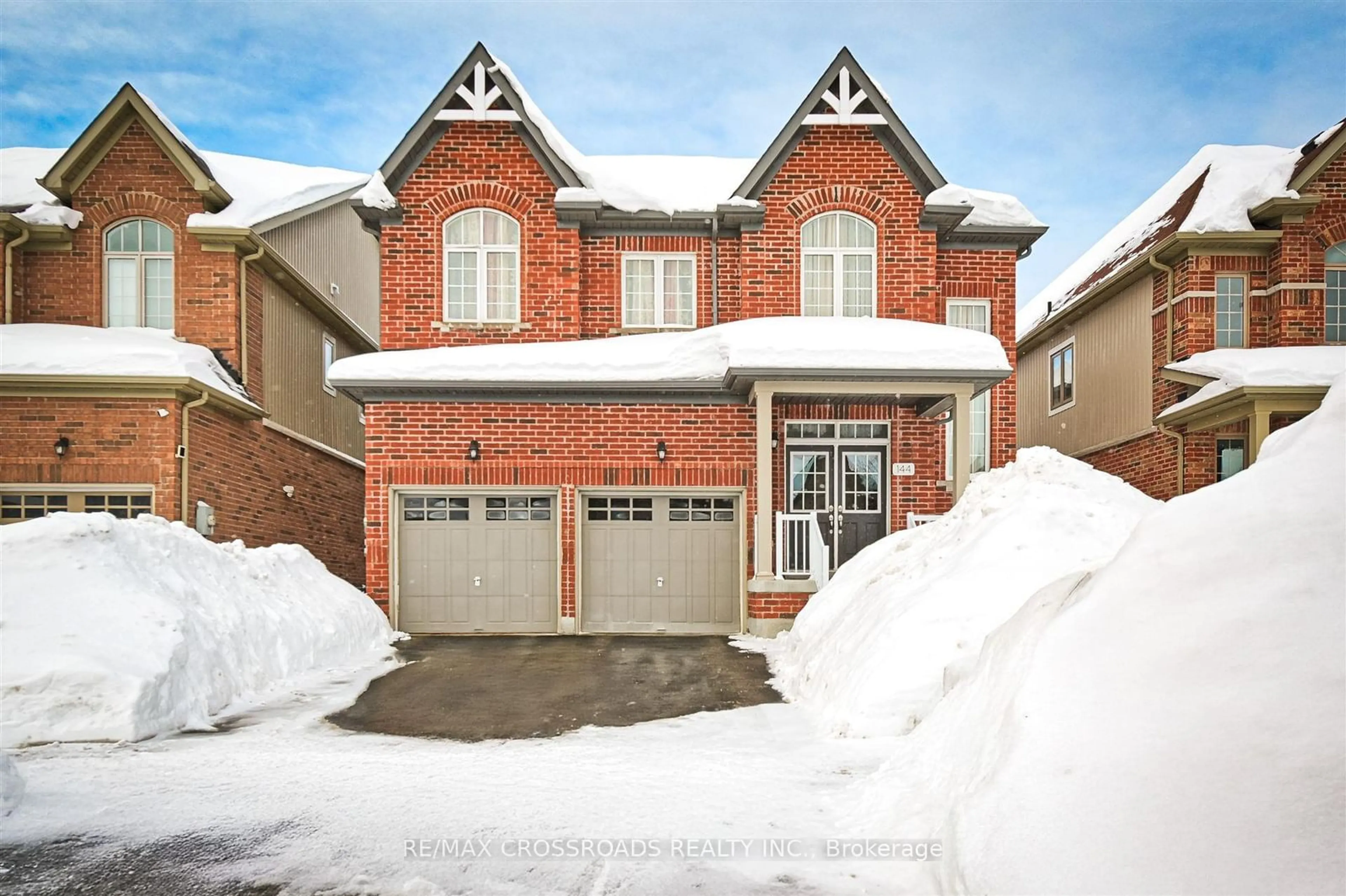 Home with brick exterior material, street for 144 Gold Park Gate, Essa Ontario L3W 0B4