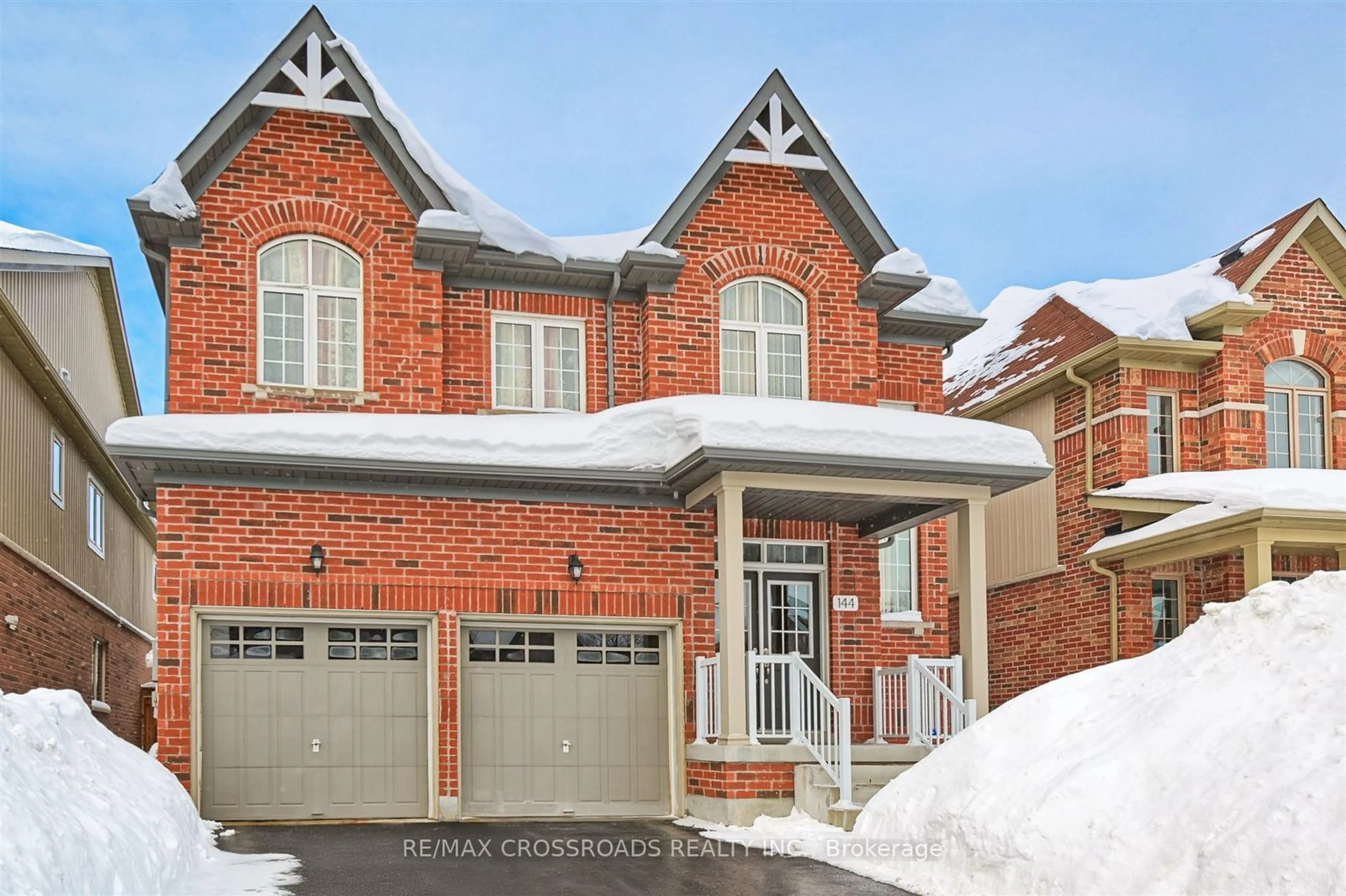 Home with brick exterior material, street for 144 Gold Park Gate, Essa Ontario L3W 0B4