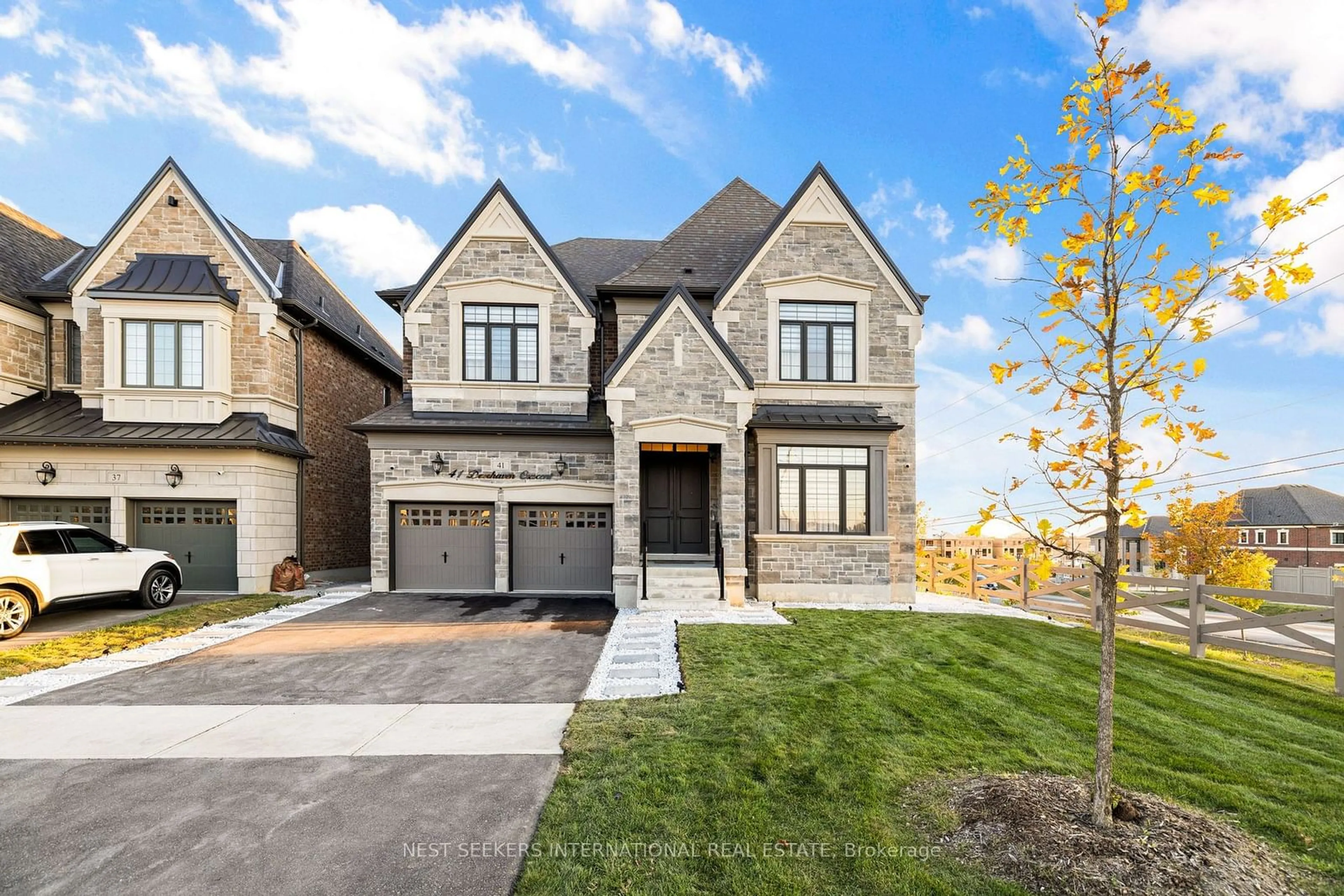 Home with brick exterior material, street for 41 Deerhaven Cres, Vaughan Ontario L4L 1A6