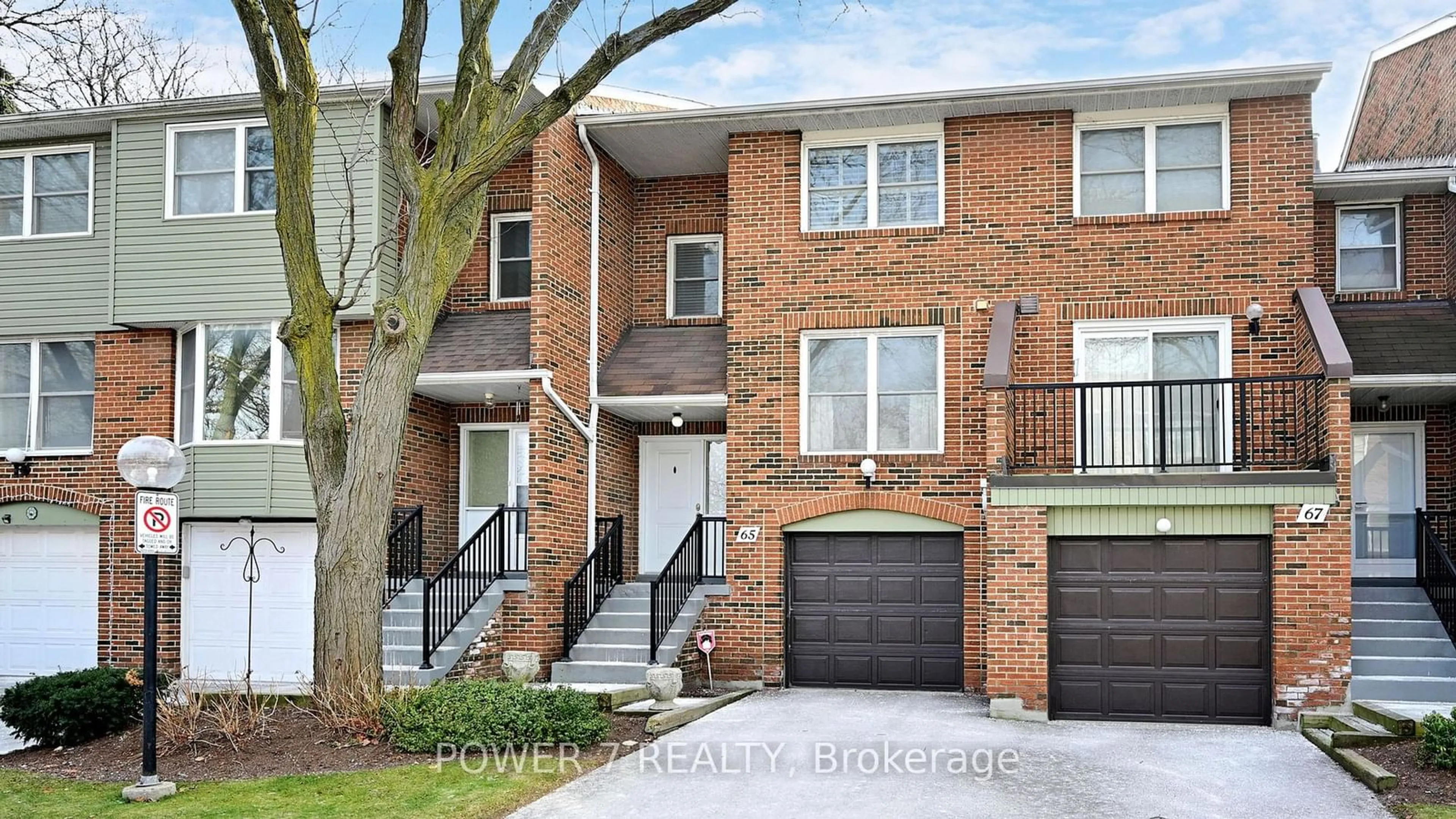 Home with brick exterior material, street for 65 Nottinghill Rd, Markham Ontario L3T 4Y3