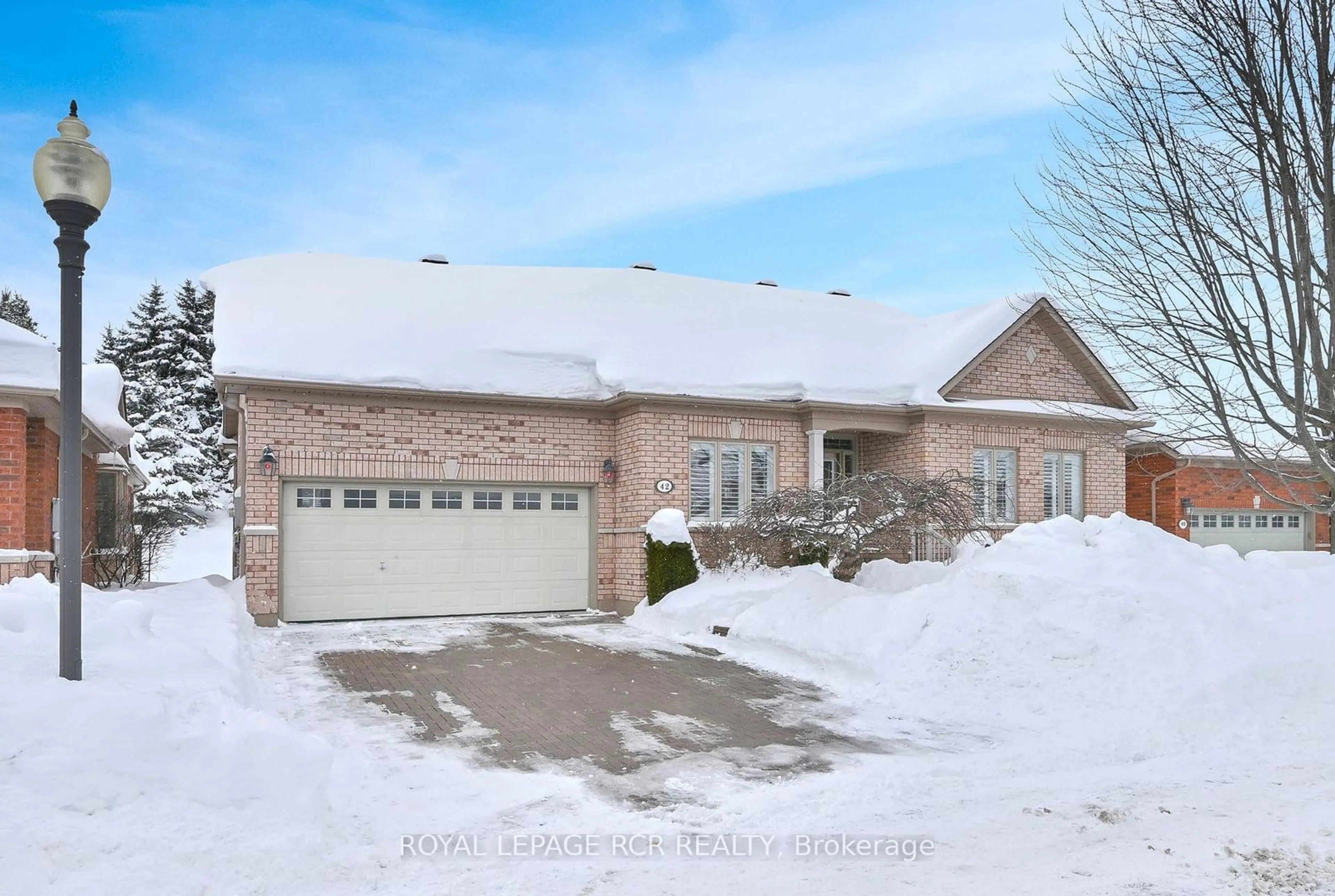 Home with brick exterior material, street for 42 Napa Ridge, New Tecumseth Ontario L9R 2E4