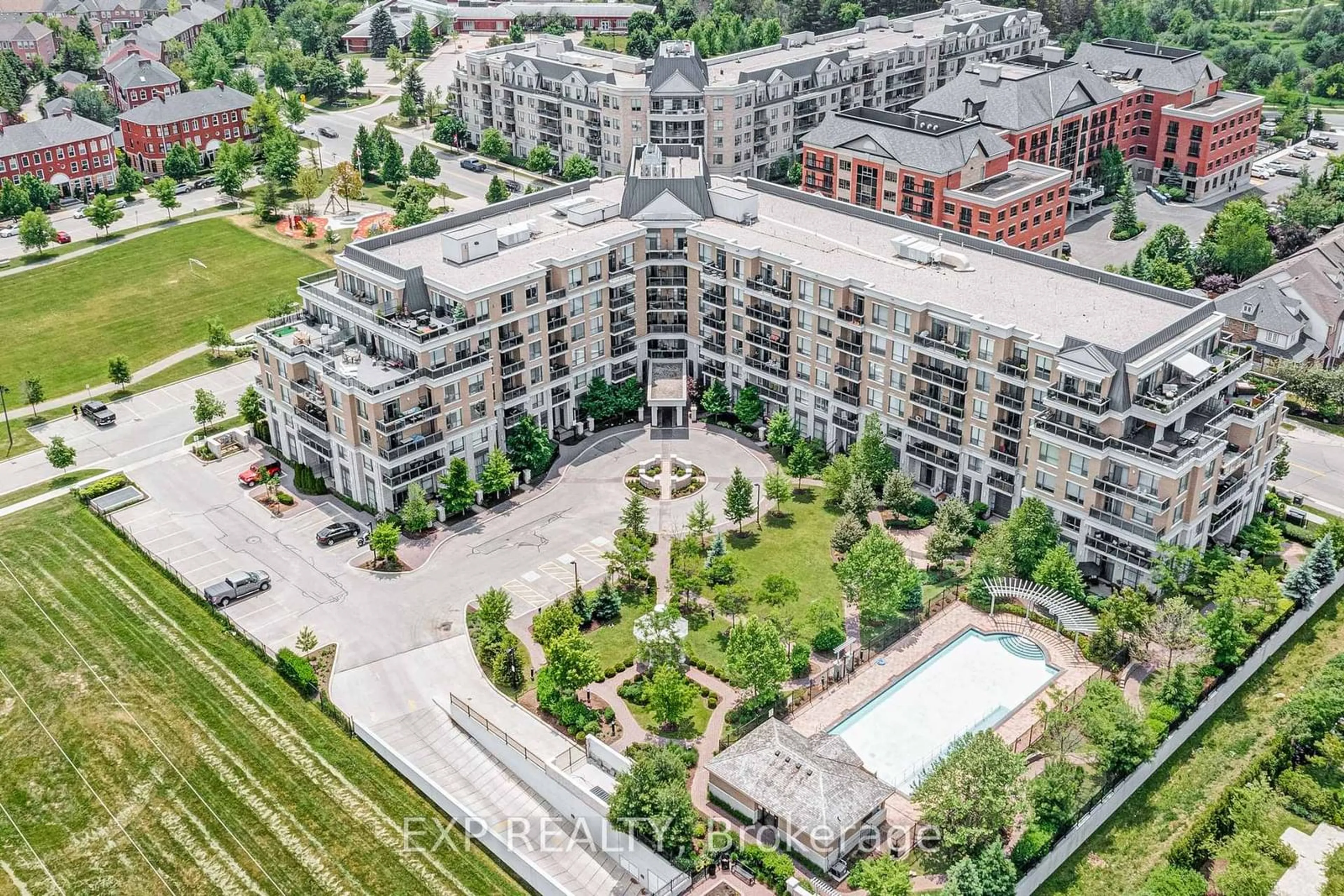 A pic from outside/outdoor area/front of a property/back of a property/a pic from drone, city buildings view from balcony for 111 Civic Square Gate #232, Aurora Ontario L4G 0S6