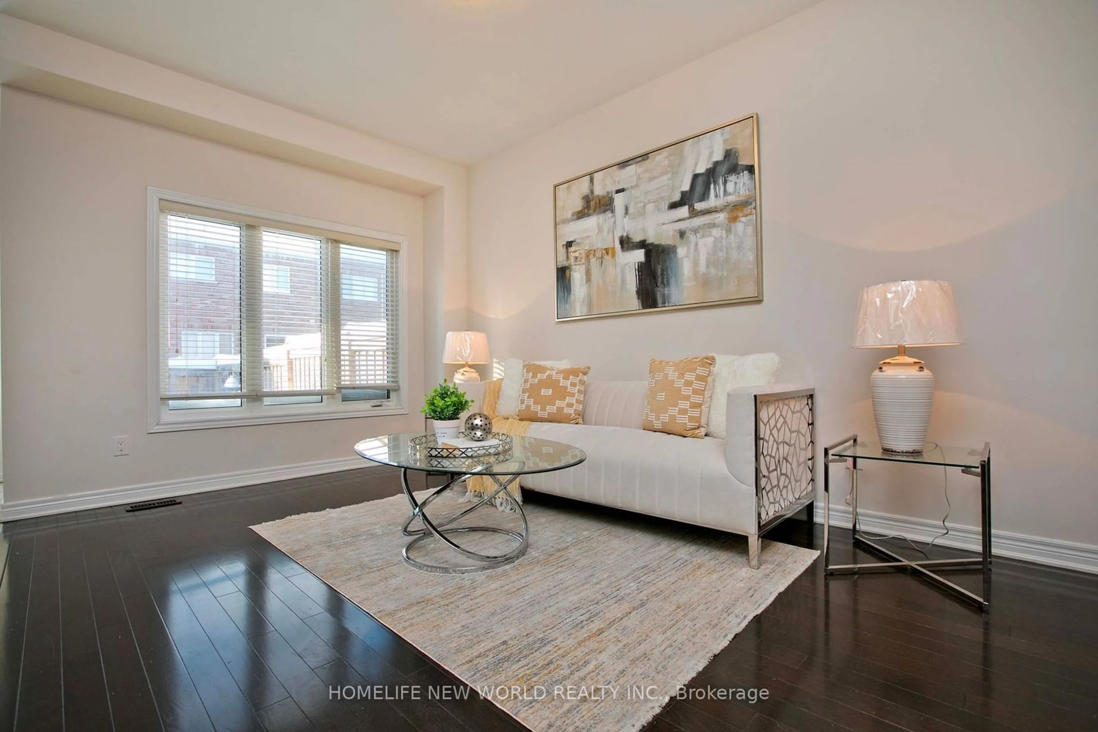 Living room with furniture, wood/laminate floor for 90 Rougeview Park Cres, Markham Ontario L6E 0P9