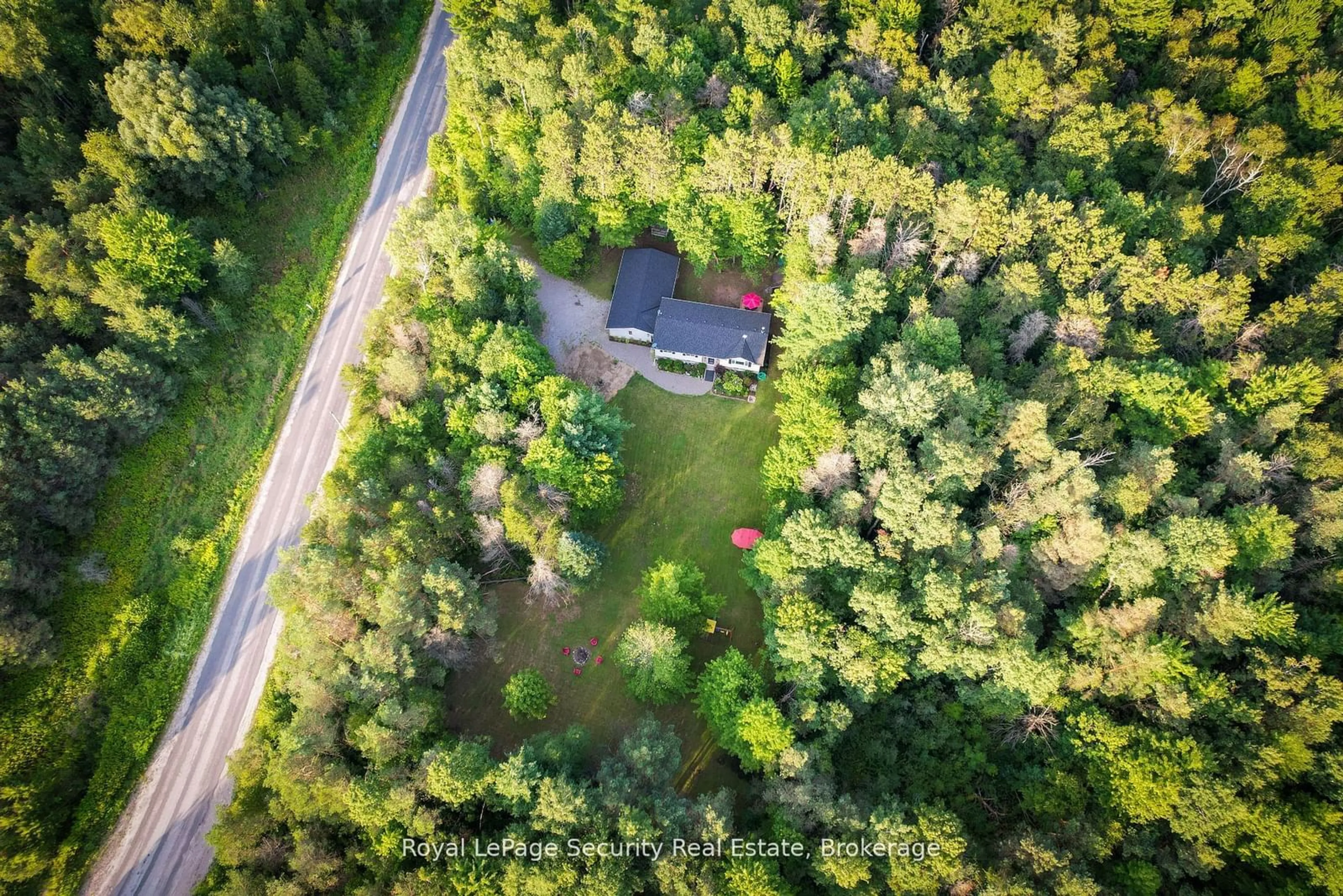 A pic from outside/outdoor area/front of a property/back of a property/a pic from drone, forest/trees view for 7458 5th Line, Essa Ontario L0M 1B1