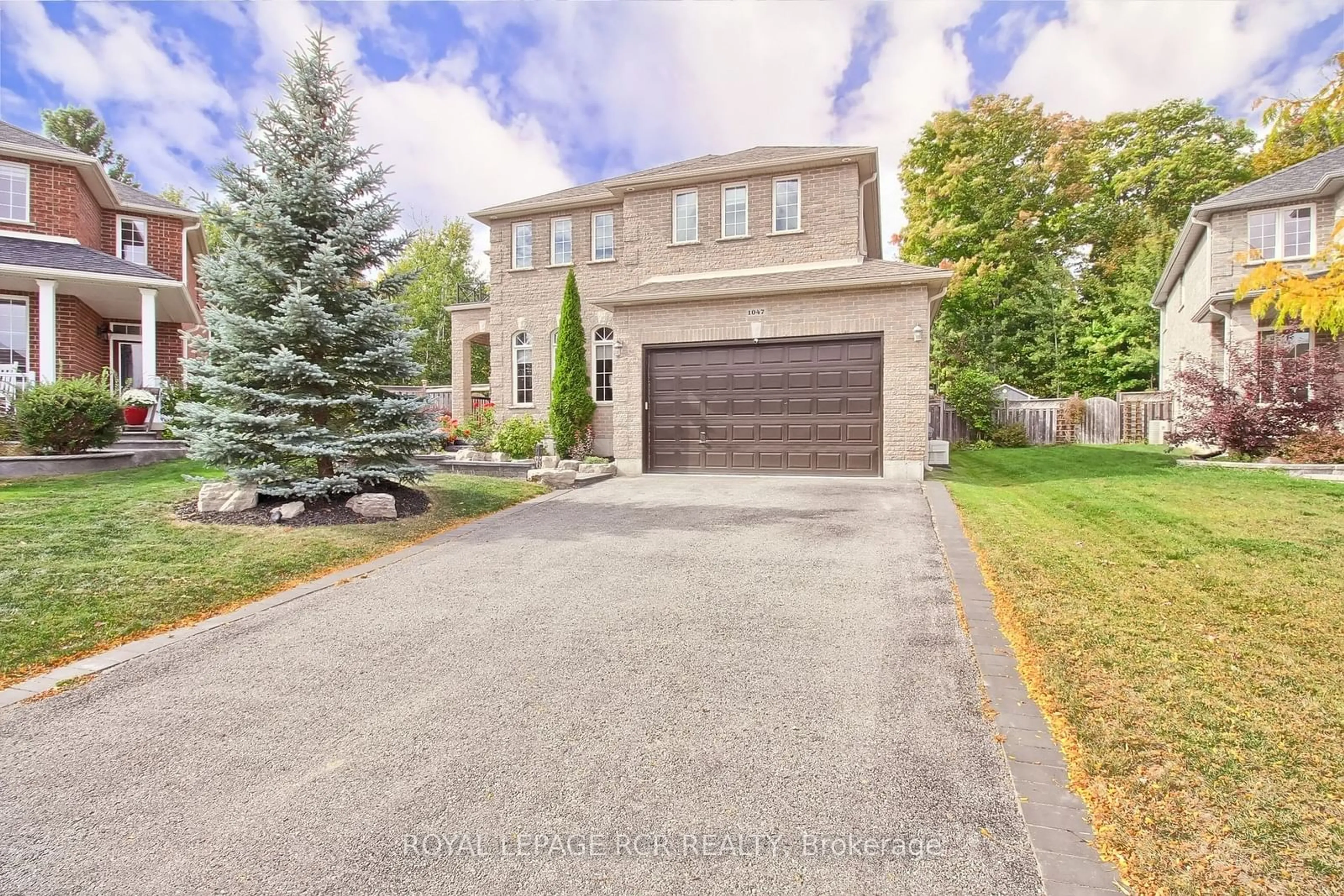 Home with brick exterior material, street for 1047 Nantyr Dr, Innisfil Ontario L9S 0A8