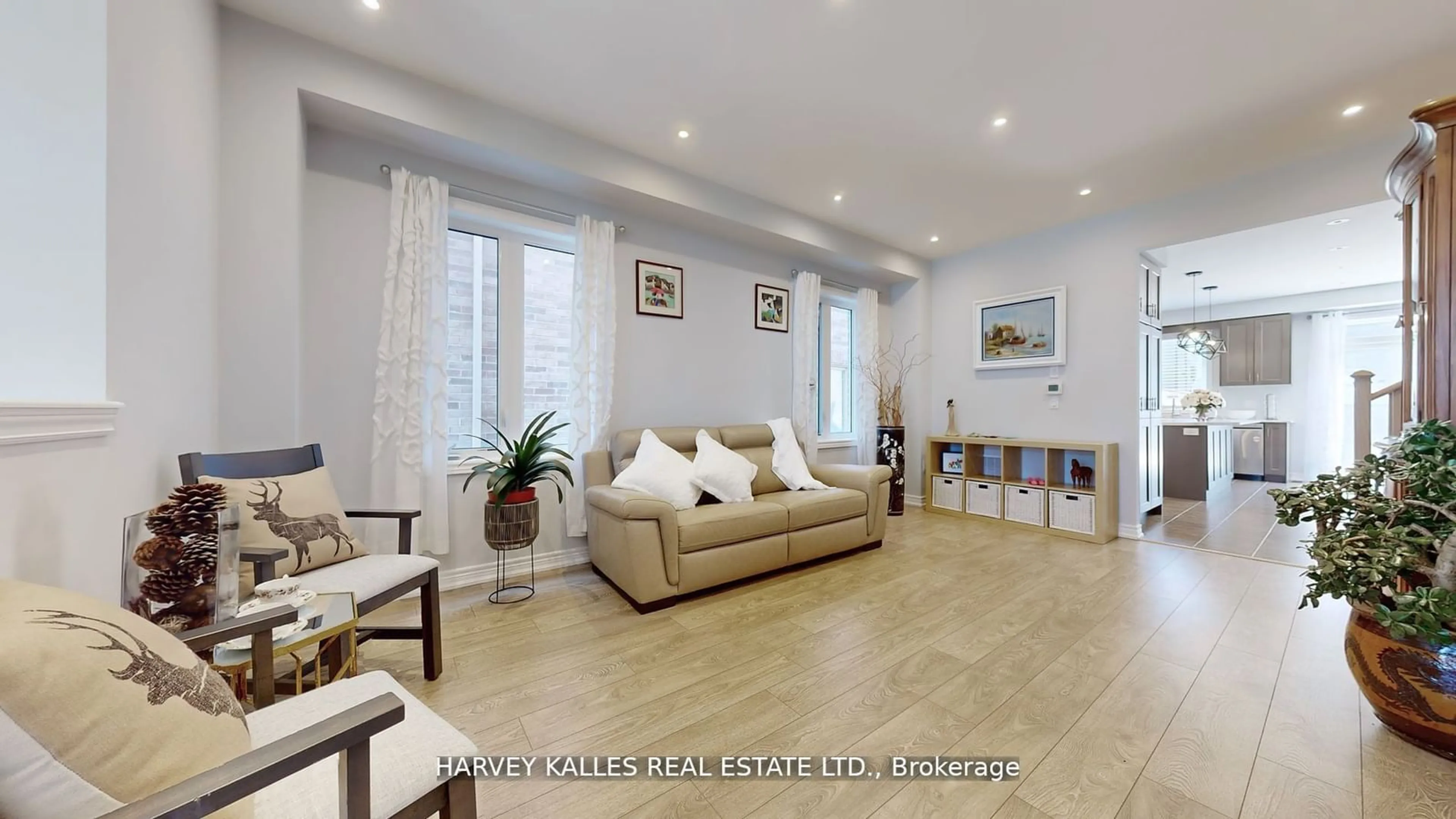 Living room with furniture, ceramic/tile floor for 67 Crofting Cres, Markham Ontario L6E 0W1