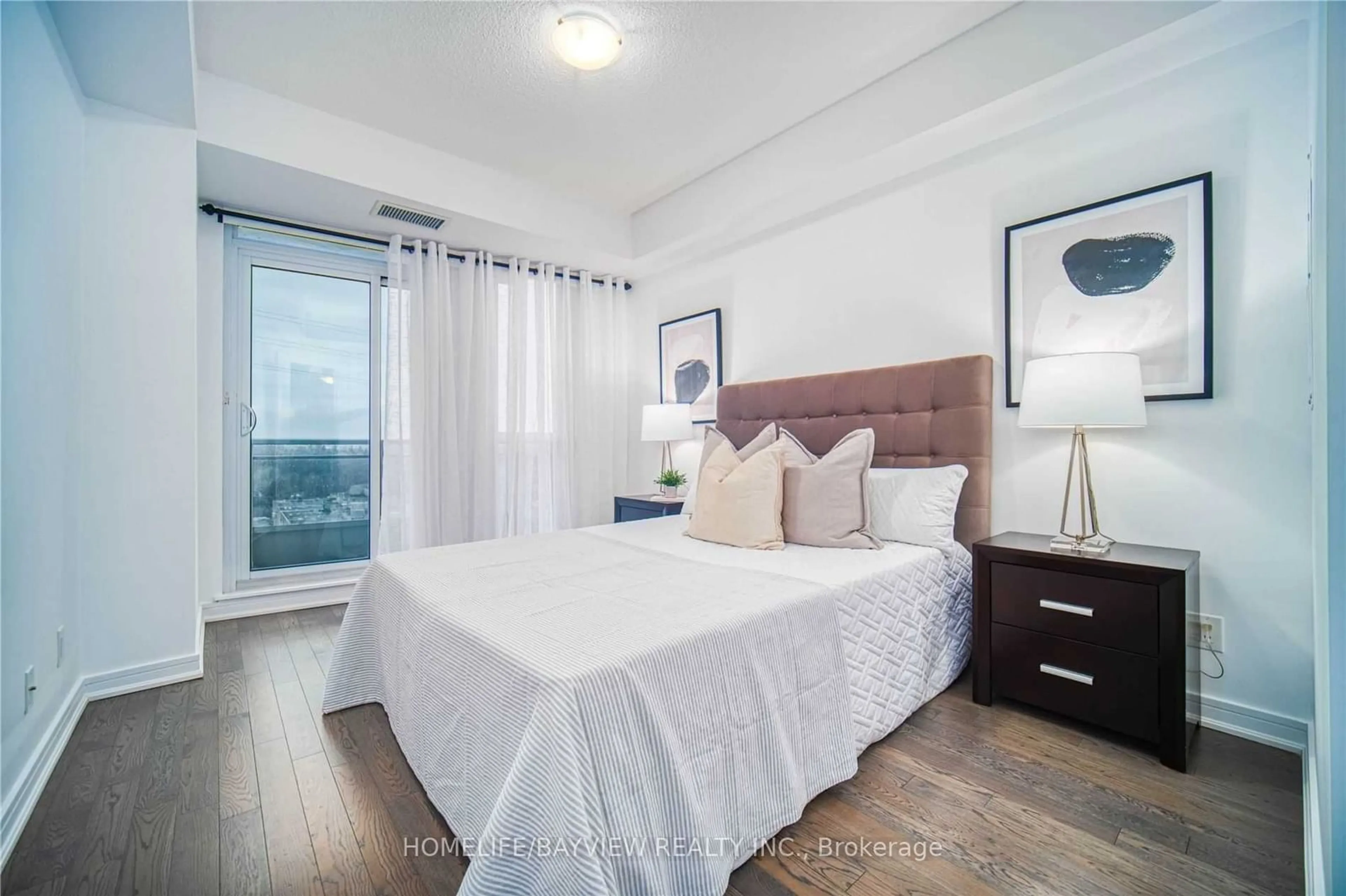 Bedroom with bed, wood/laminate floor for 9201 Yonge St #515, Richmond Hill Ontario L4C 6Z2