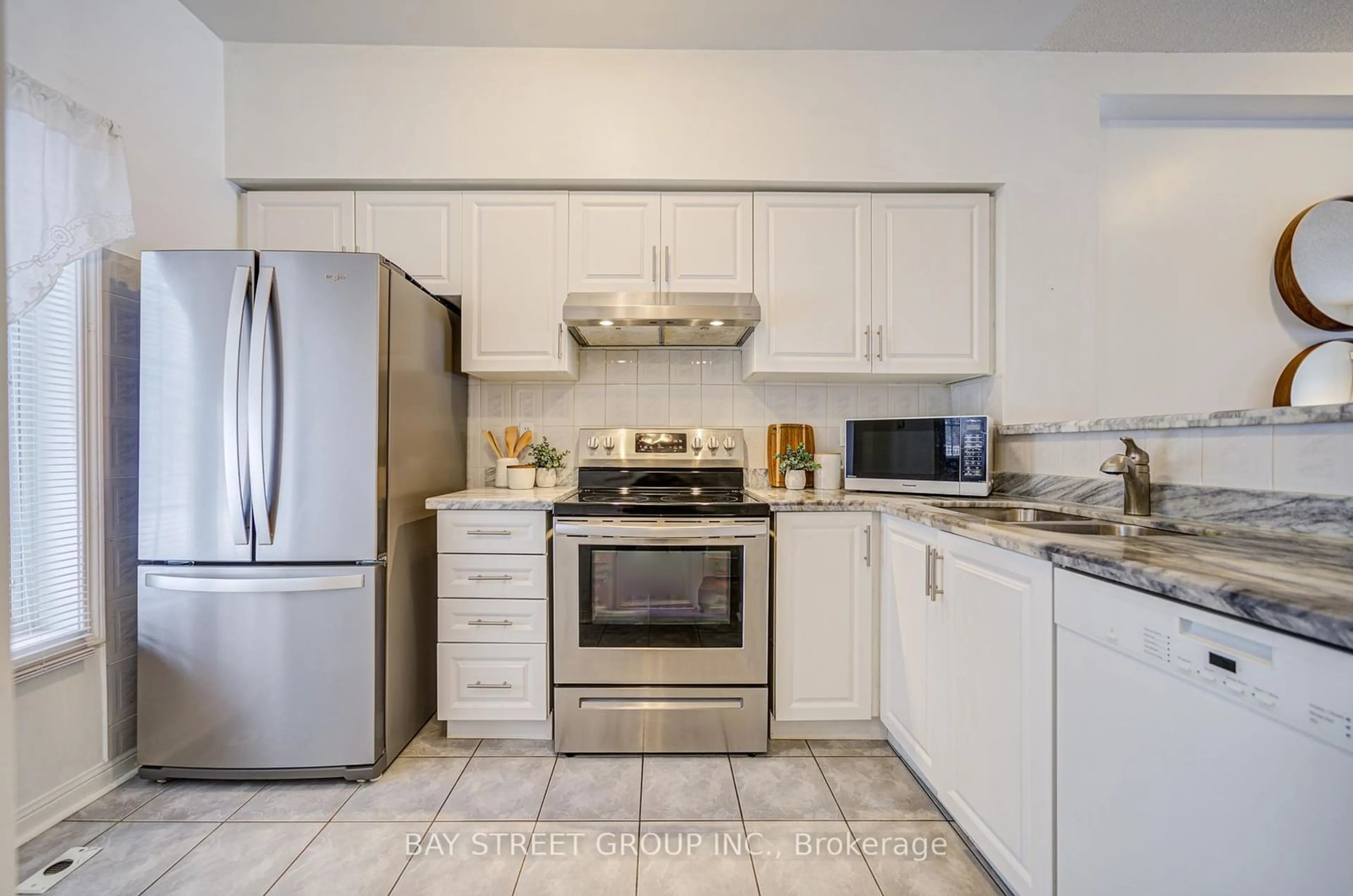 Standard kitchen, ceramic/tile floor for 10 St Moritz Way #6, Markham Ontario L3R 4G4