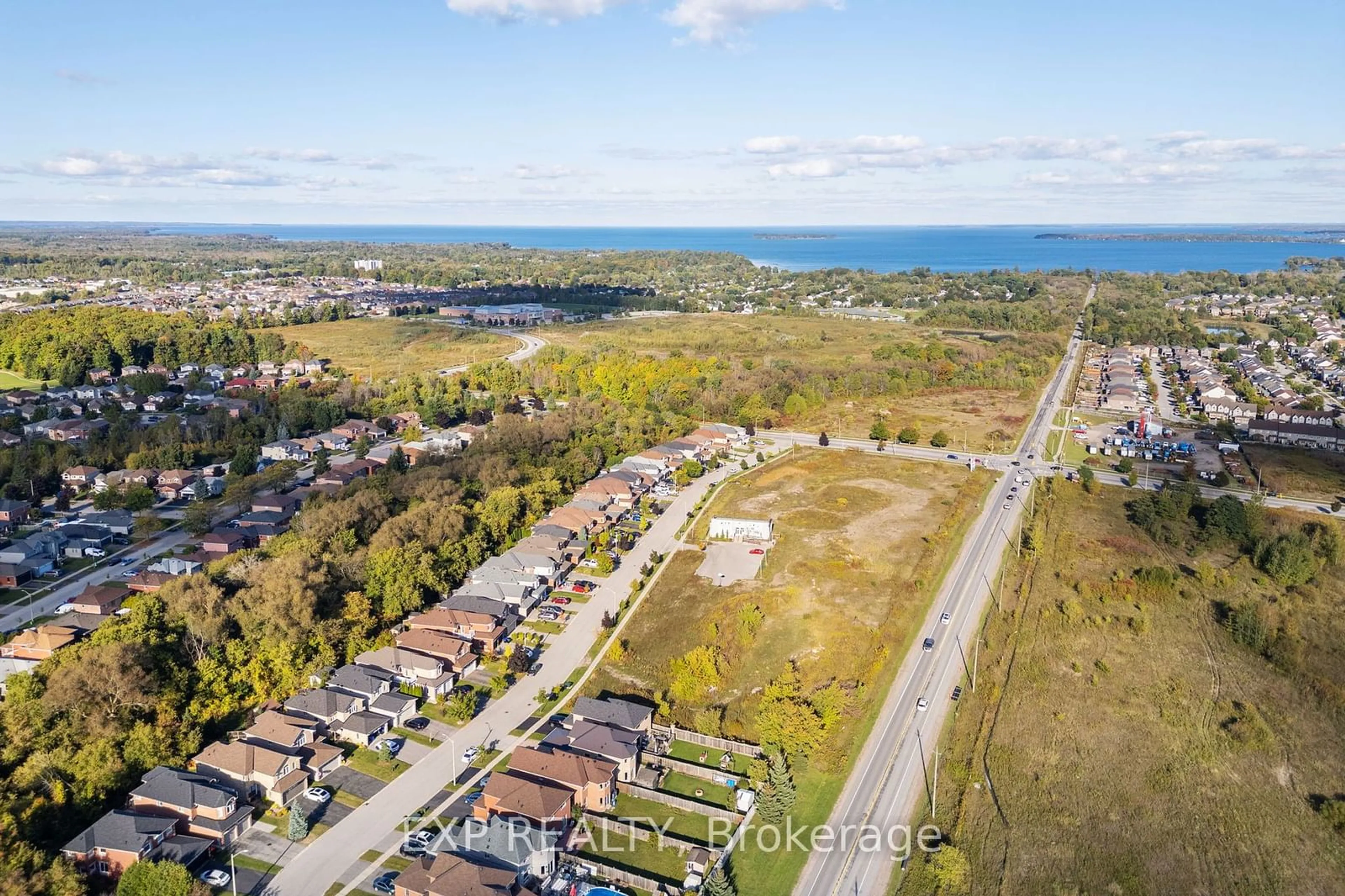 A pic from outside/outdoor area/front of a property/back of a property/a pic from drone, water/lake/river/ocean view for 1316 Fox Hill St, Innisfil Ontario L9S 4Y6