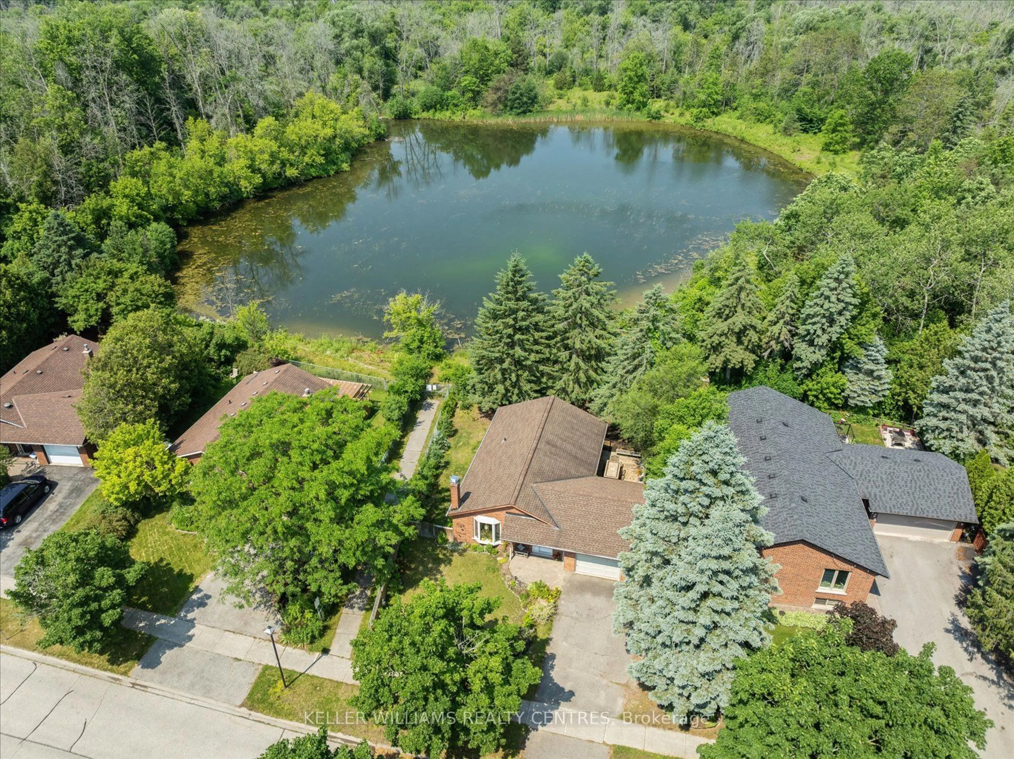 A pic from outside/outdoor area/front of a property/back of a property/a pic from drone, water/lake/river/ocean view for 150 Olive St, East Gwillimbury Ontario L9N 1M2