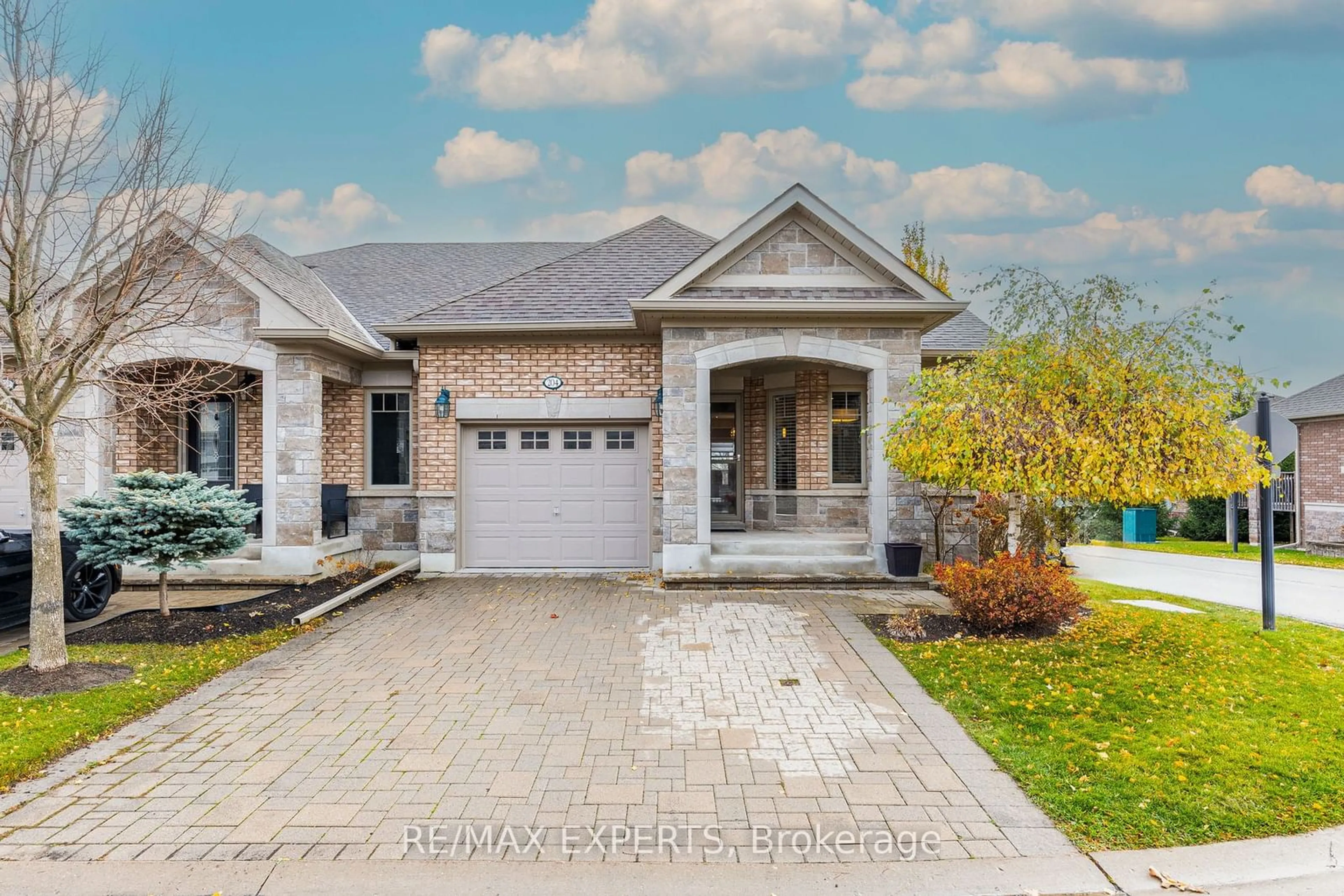 Home with brick exterior material, street for 204 Ridge Way, New Tecumseth Ontario L9R 0K5