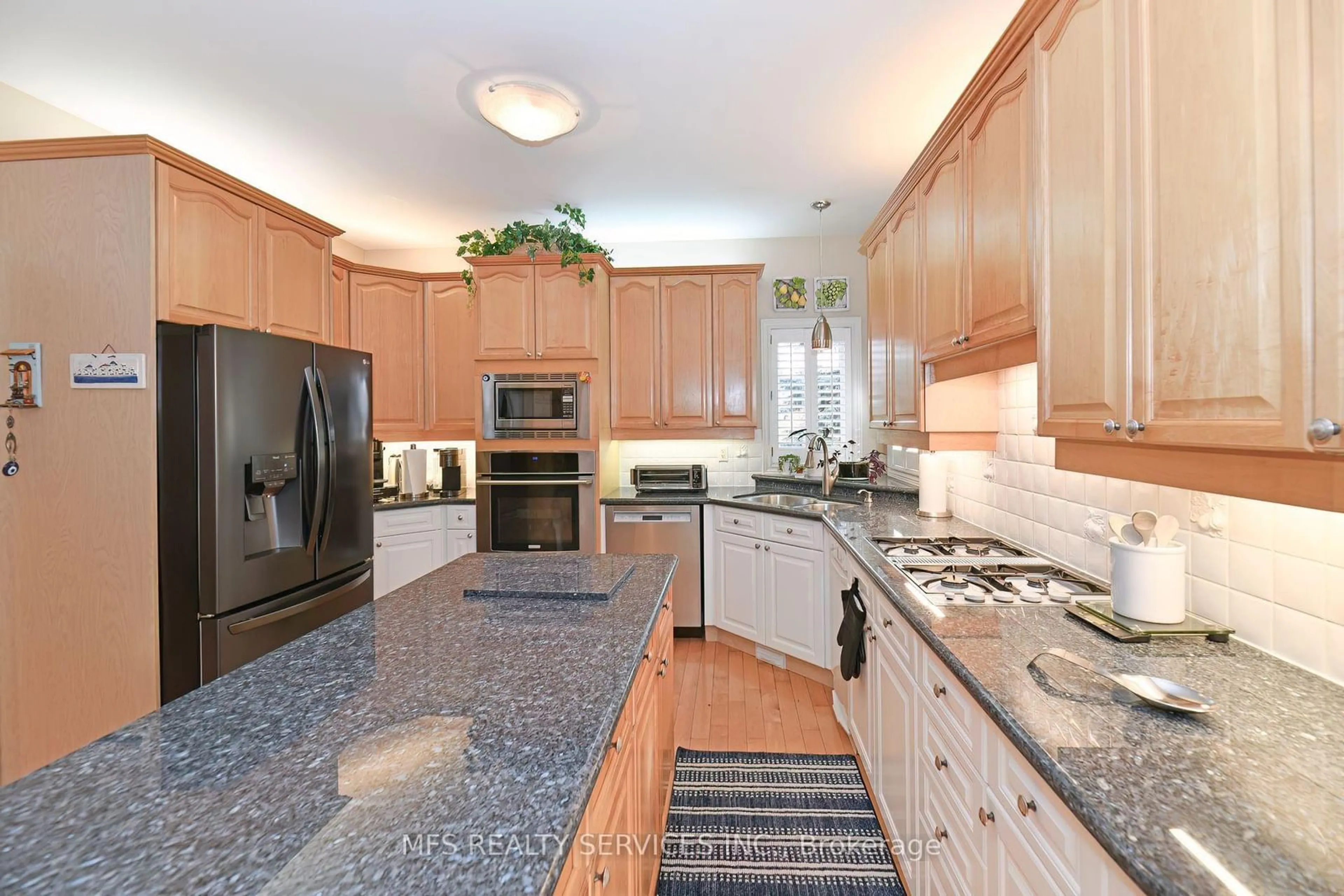 Contemporary kitchen, ceramic/tile floor for 9 Richview Crt, Markham Ontario L3T 7S9