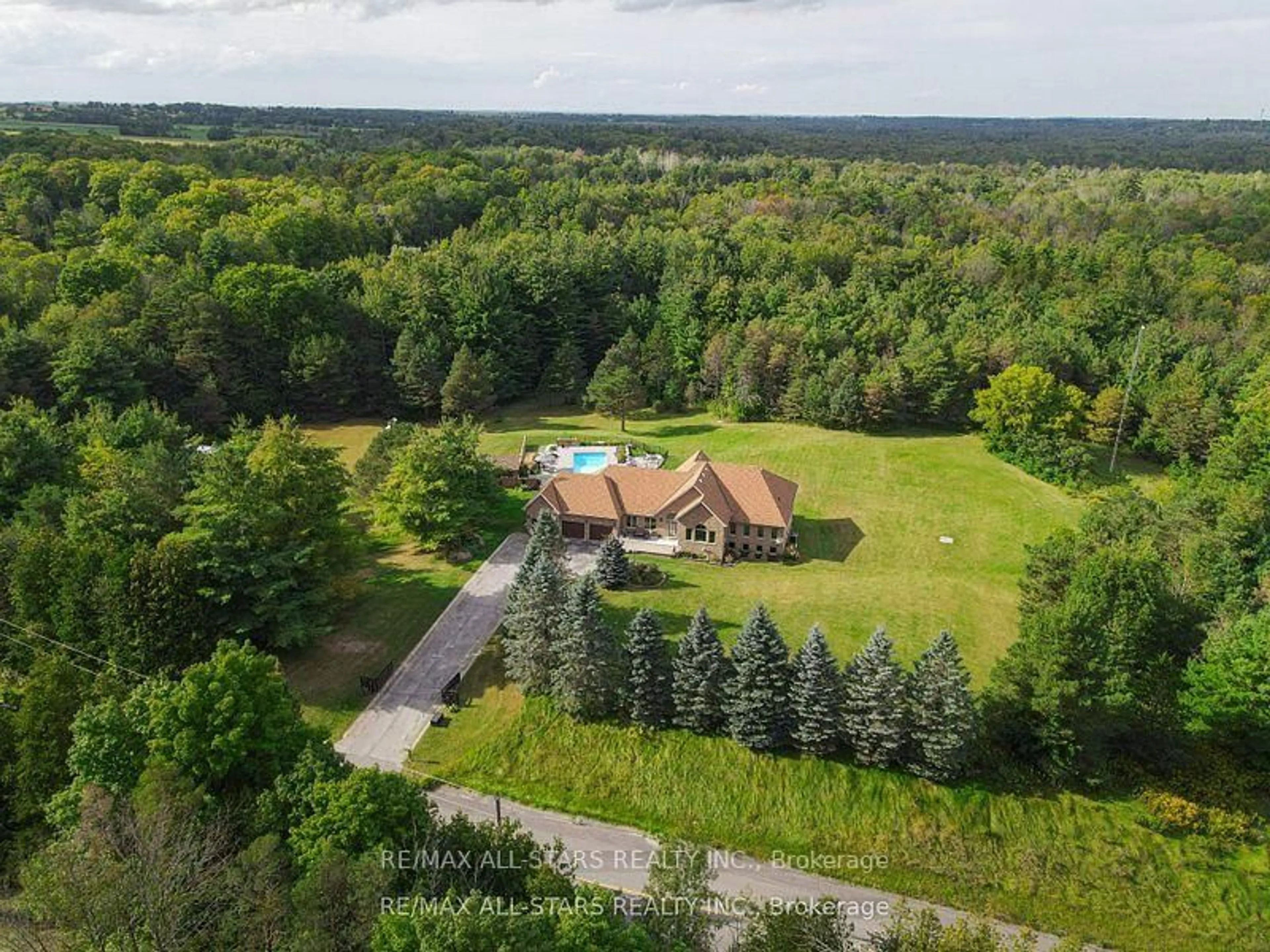 A pic from outside/outdoor area/front of a property/back of a property/a pic from drone, forest/trees view for 210 Ashworth Rd, Uxbridge Ontario L0G 1M0