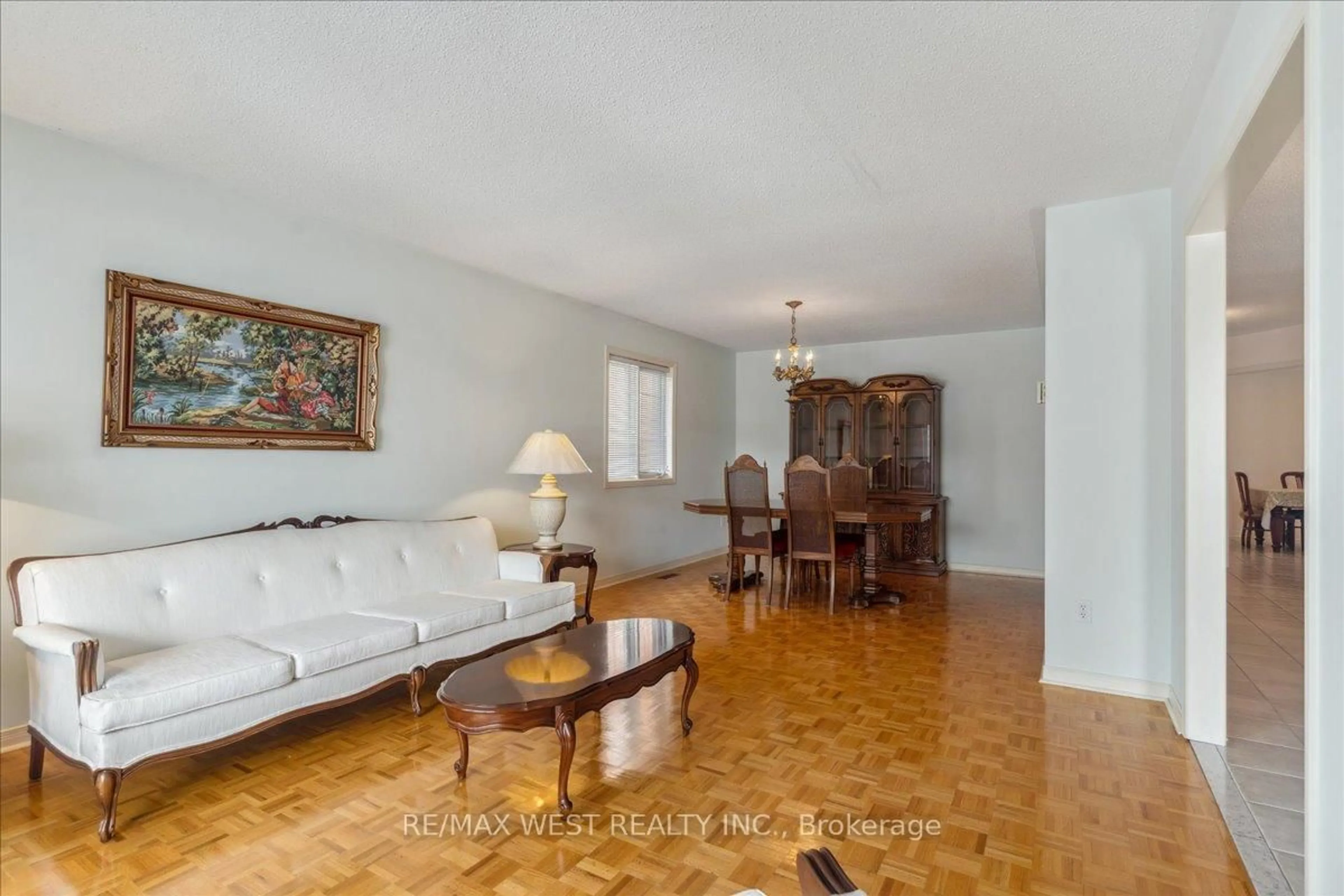 Living room with furniture, wood/laminate floor for 65 Gates Rd, Vaughan Ontario L4L 8R6