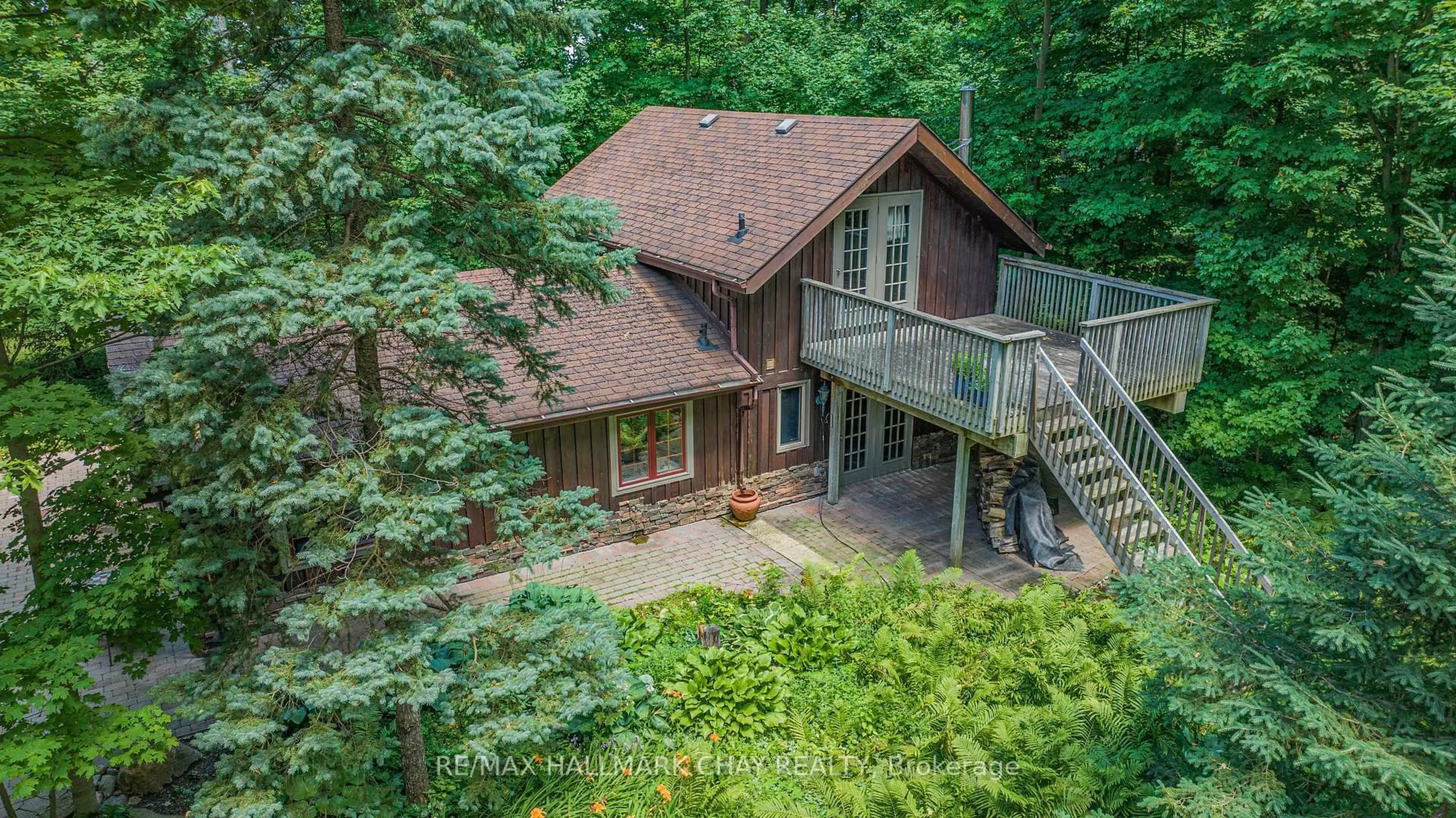 A pic from outside/outdoor area/front of a property/back of a property/a pic from drone, forest/trees view for 4507 10th Line, Bradford West Gwillimbury Ontario L0G 1A0