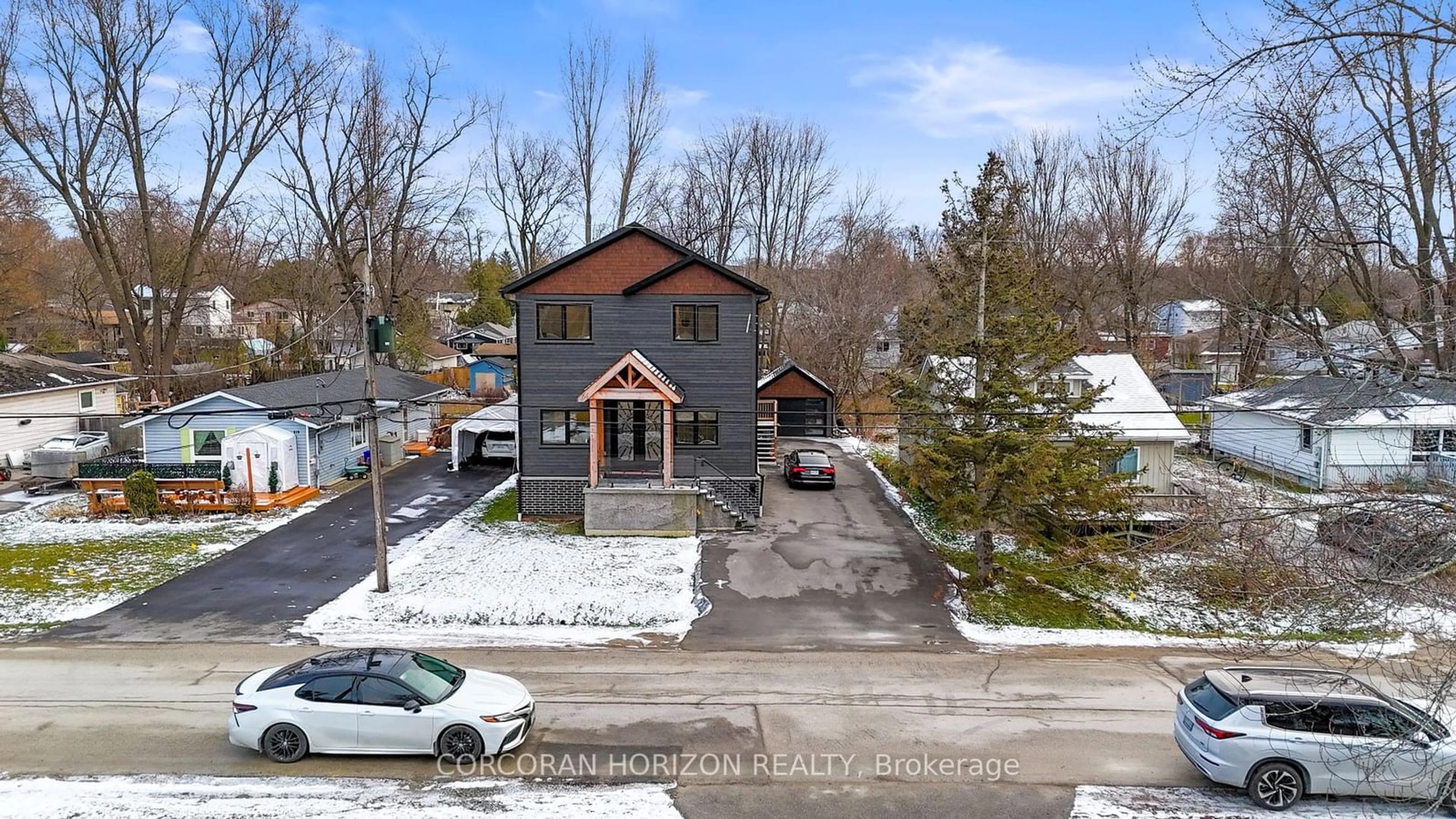 A pic from outside/outdoor area/front of a property/back of a property/a pic from drone, unknown for 215 Bayview Ave, Georgina Ontario L4P 2T3