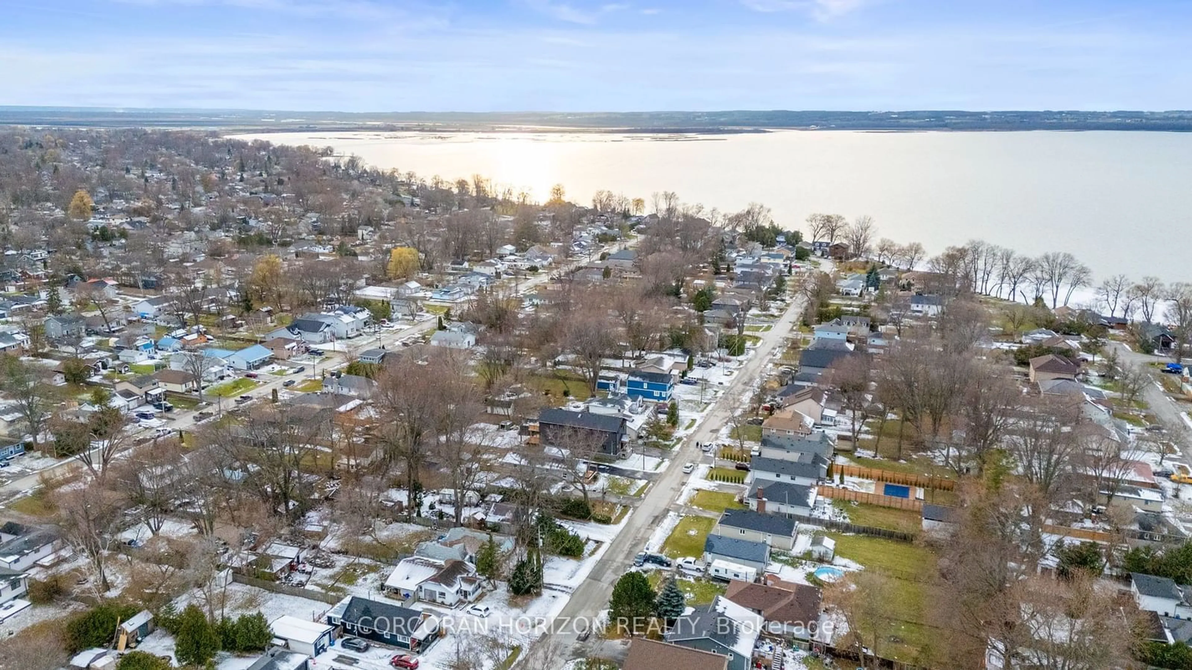 A pic from outside/outdoor area/front of a property/back of a property/a pic from drone, water/lake/river/ocean view for 215 Bayview Ave, Georgina Ontario L4P 2T3