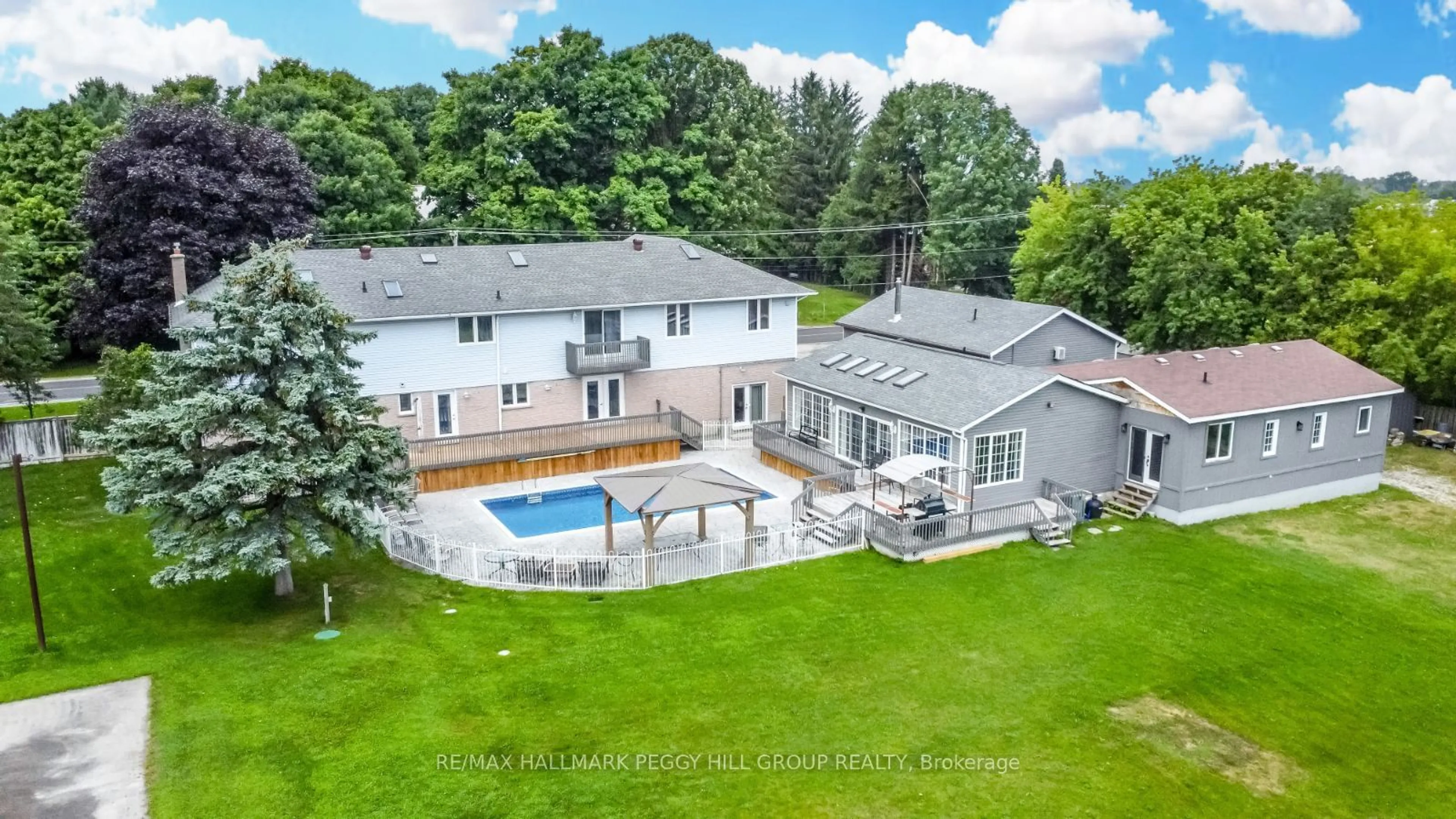 A pic from outside/outdoor area/front of a property/back of a property/a pic from drone, water/lake/river/ocean view for 1923 10th Line, Innisfil Ontario L9S 3P5