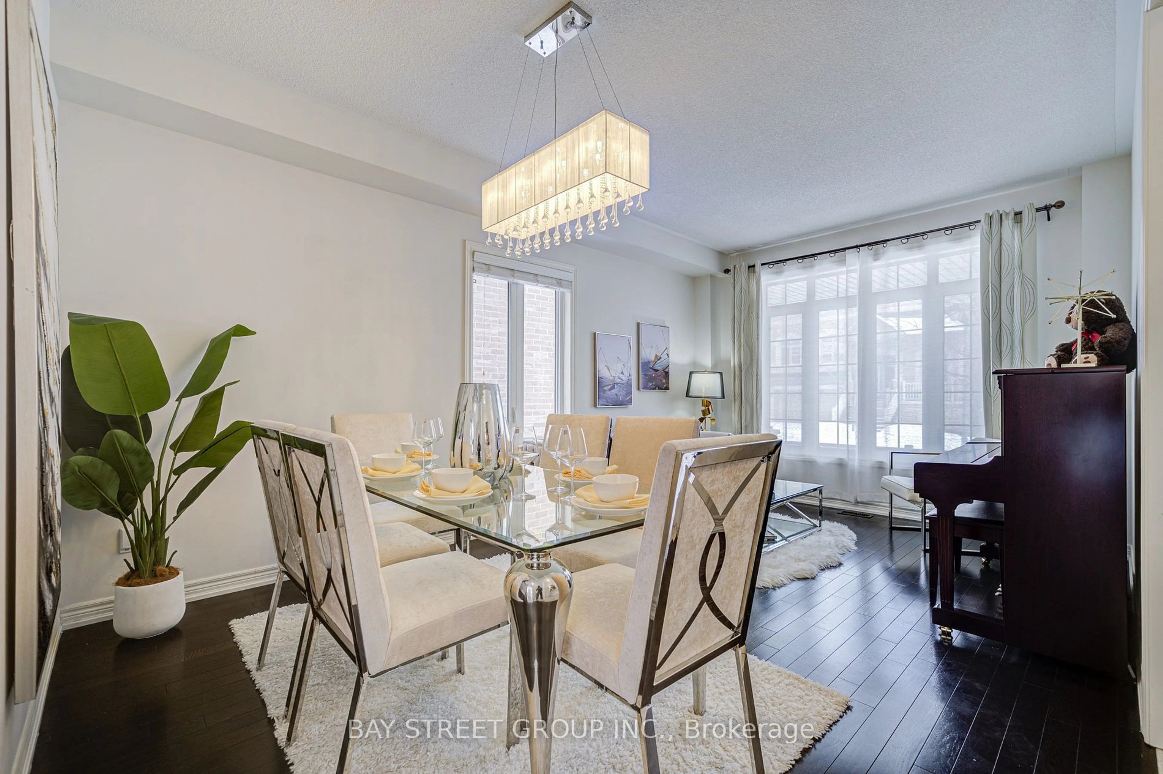 Dining room, wood/laminate floor for 74 Kentland St, Markham Ontario L6E 0L2