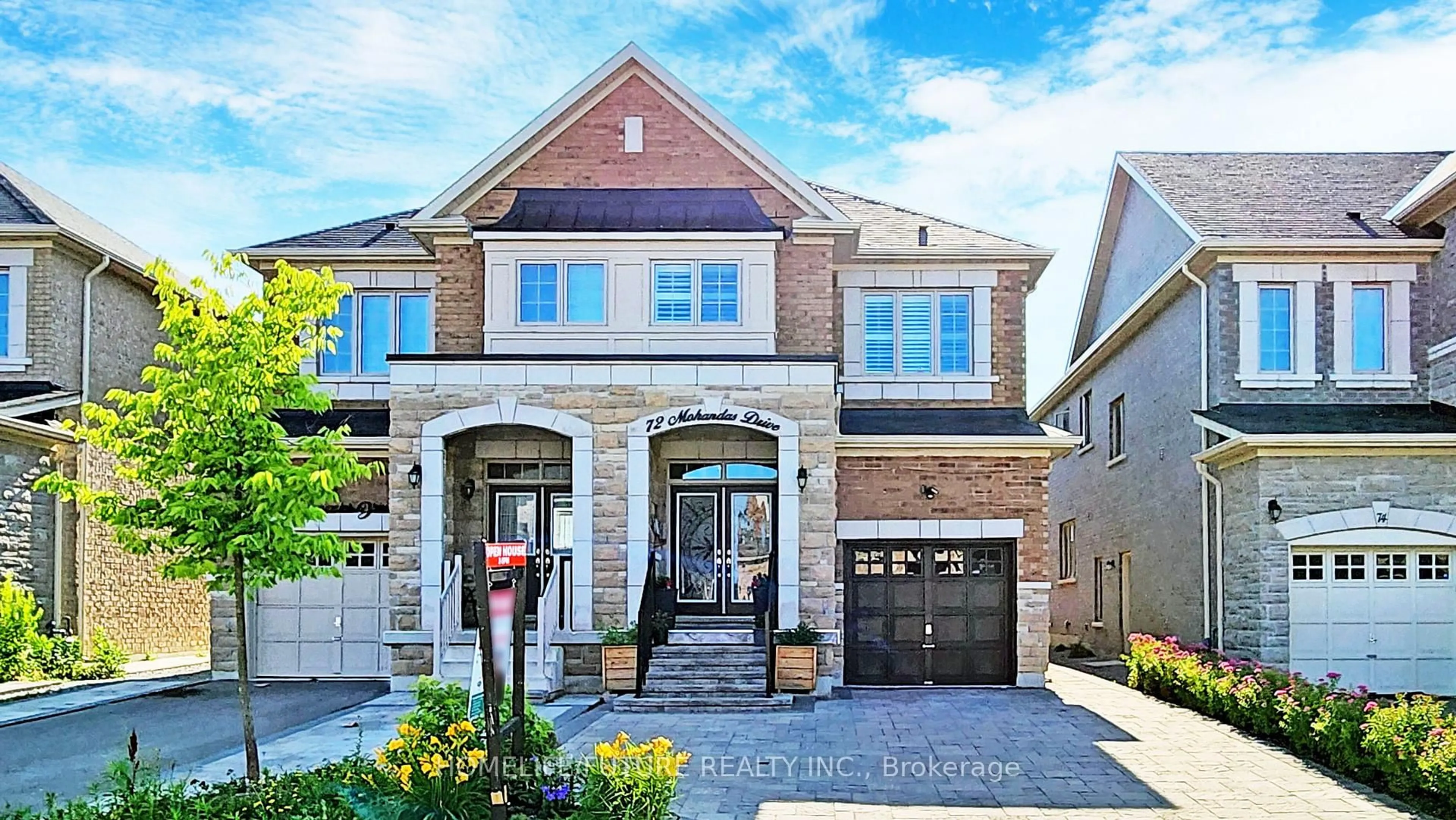 Home with brick exterior material, street for 72 Mohandas Dr, Markham Ontario L3S 0E4