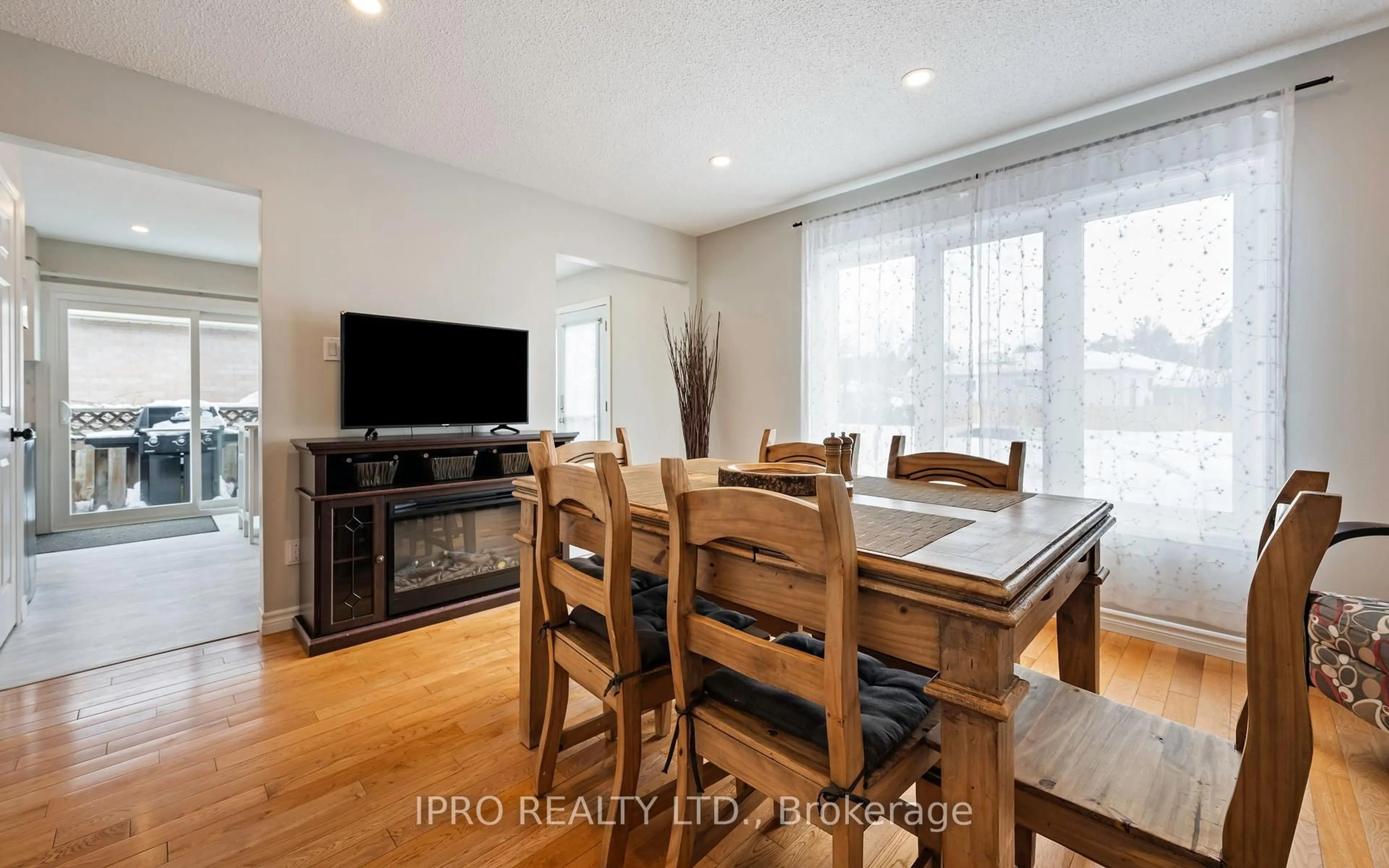 Dining room, wood/laminate floor for 11 Mcqueen St, Essa Ontario L0M 1B0