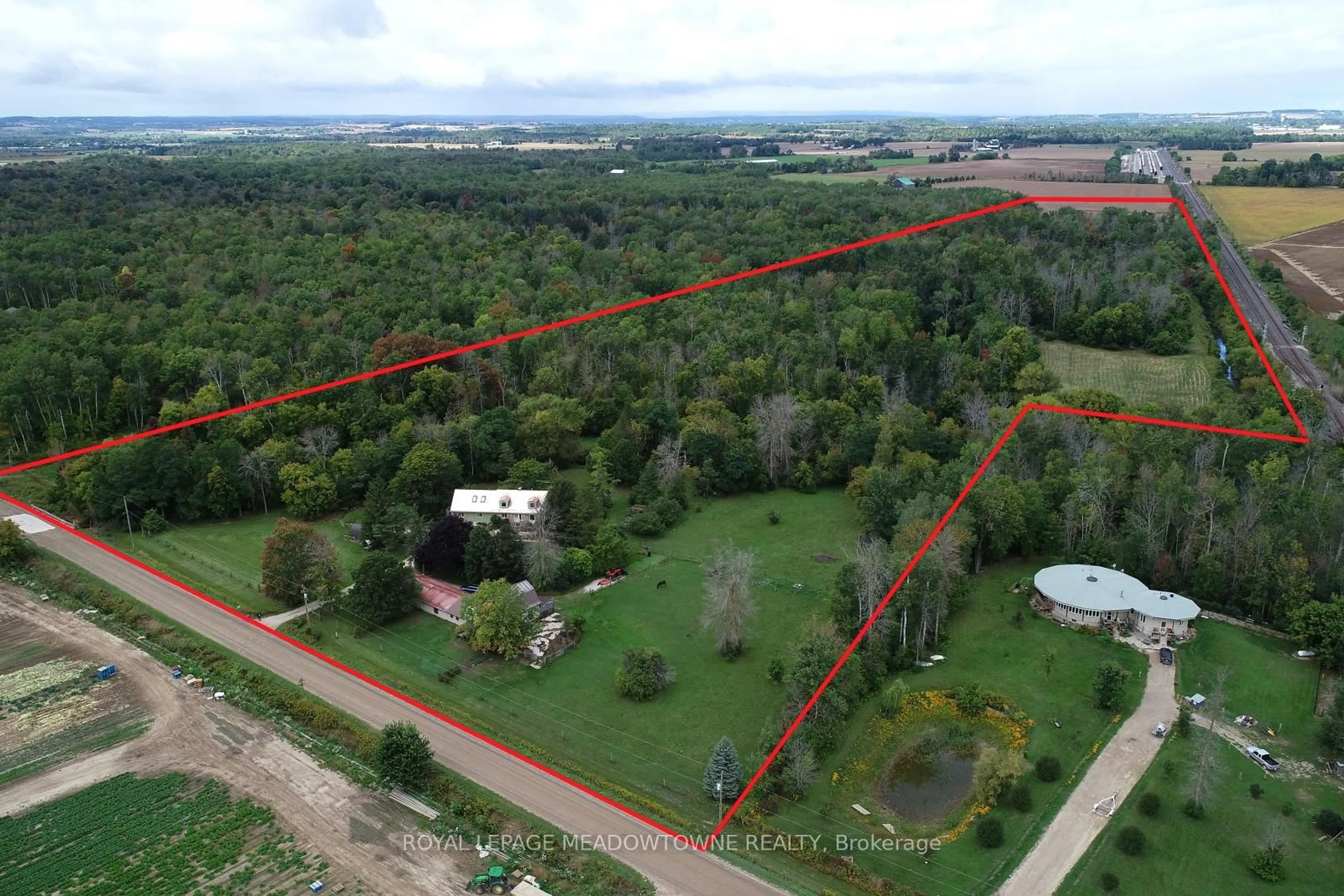 A pic from outside/outdoor area/front of a property/back of a property/a pic from drone, unknown for 6824 10th Line, New Tecumseth Ontario L0G 1A0