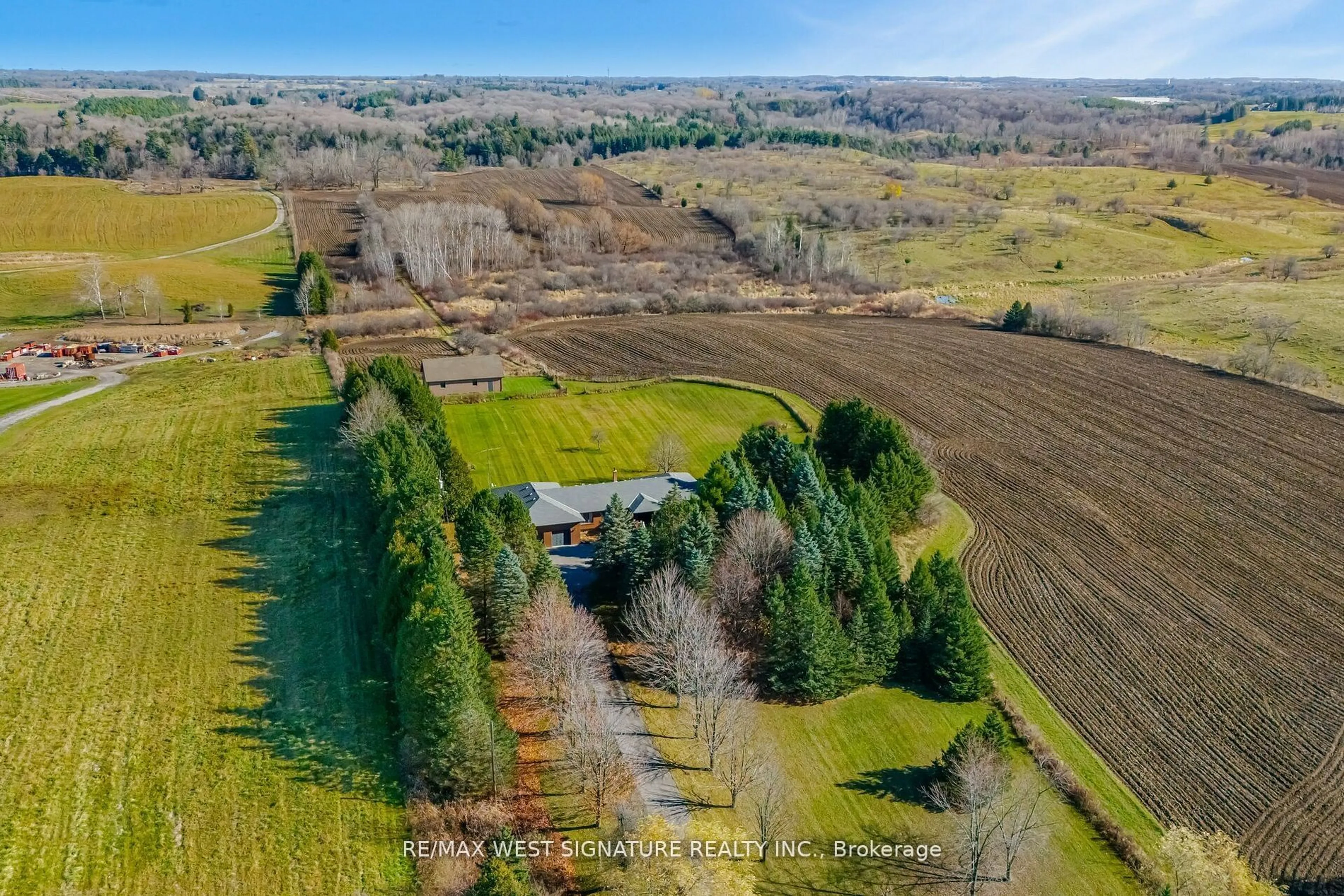 A pic from outside/outdoor area/front of a property/back of a property/a pic from drone, forest/trees view for 13485 8th concession Rd, King Ontario L7B 1K4