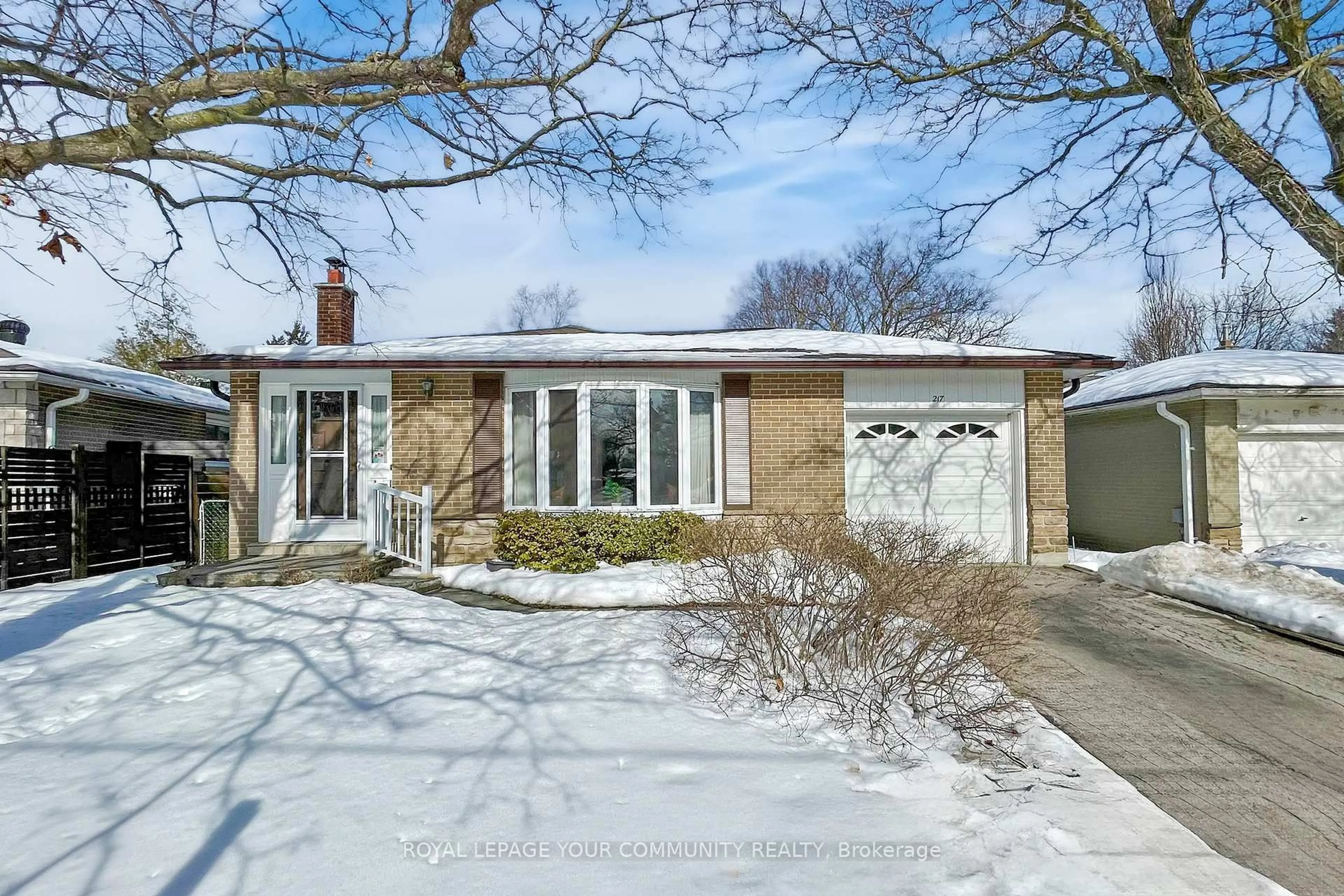 Home with brick exterior material, street for 217 Bay Thorn Dr, Markham Ontario L3T 3V6