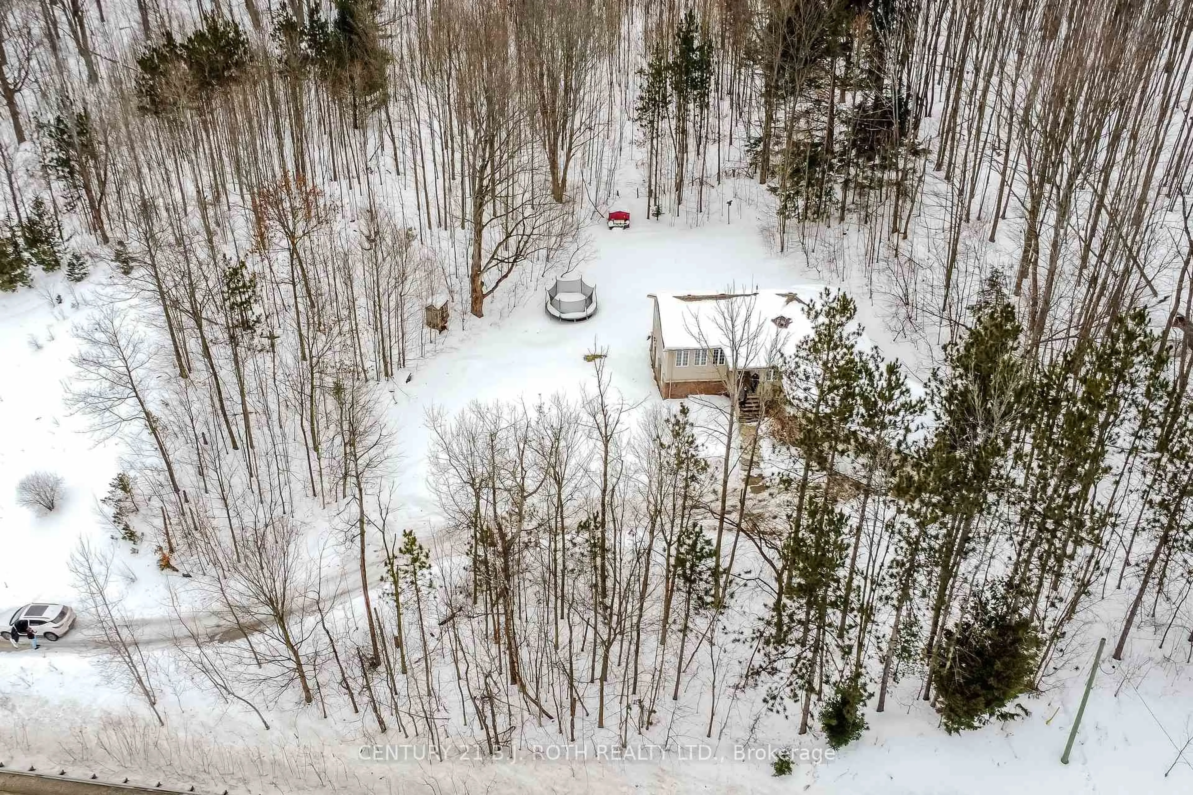 A pic from outside/outdoor area/front of a property/back of a property/a pic from drone, forest/trees view for 4927 25 Side Rd, Essa Ontario L4M 4S4