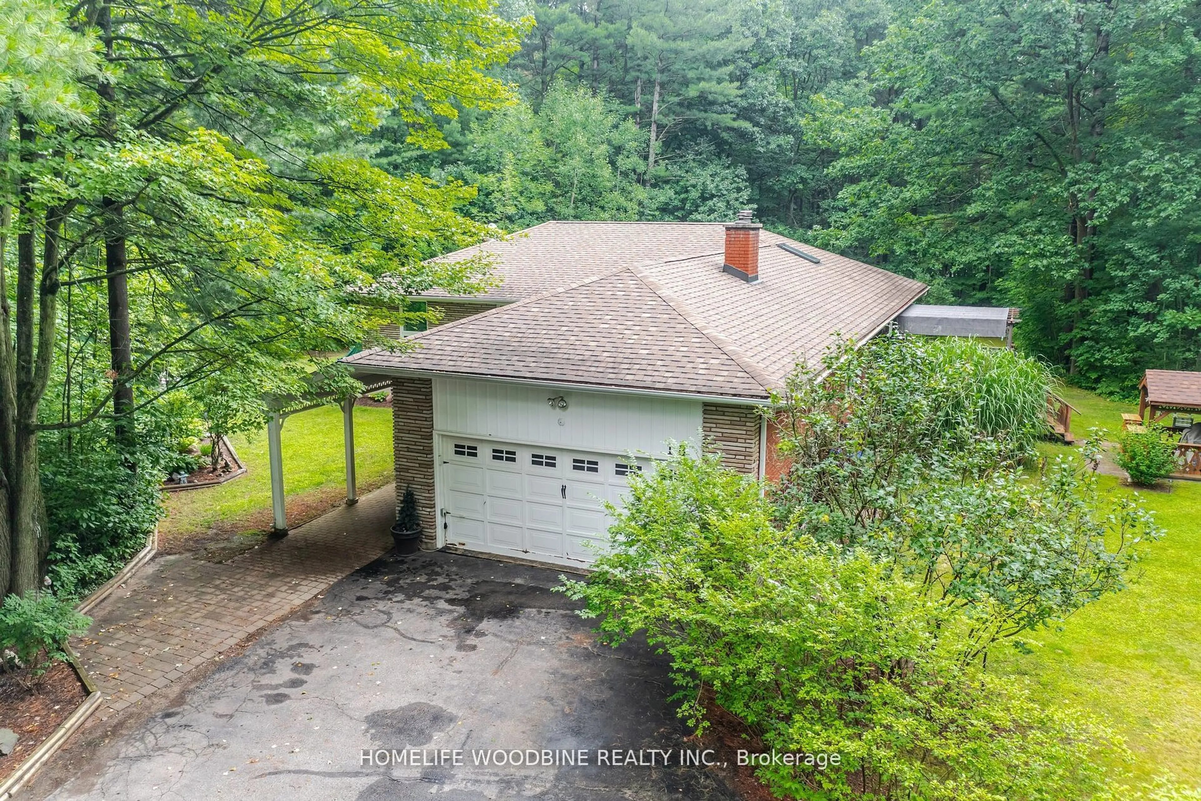 A pic from outside/outdoor area/front of a property/back of a property/a pic from drone, unknown for 18 Woodland Heights Dr, Adjala-Tosorontio Ontario L0M 1J0