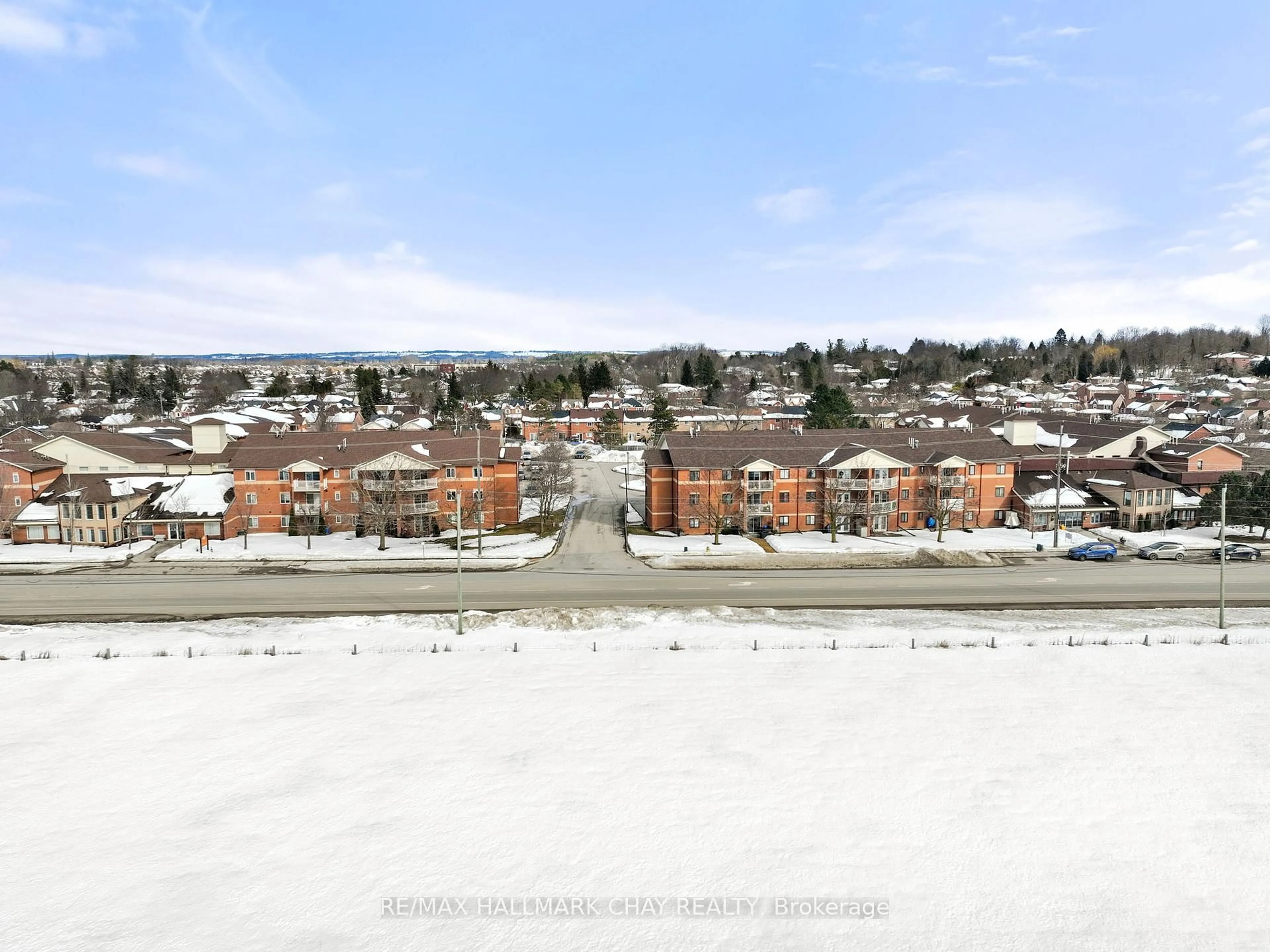 A pic from outside/outdoor area/front of a property/back of a property/a pic from drone, city buildings view from balcony for 247 King St #202, New Tecumseth Ontario L9R 1N4