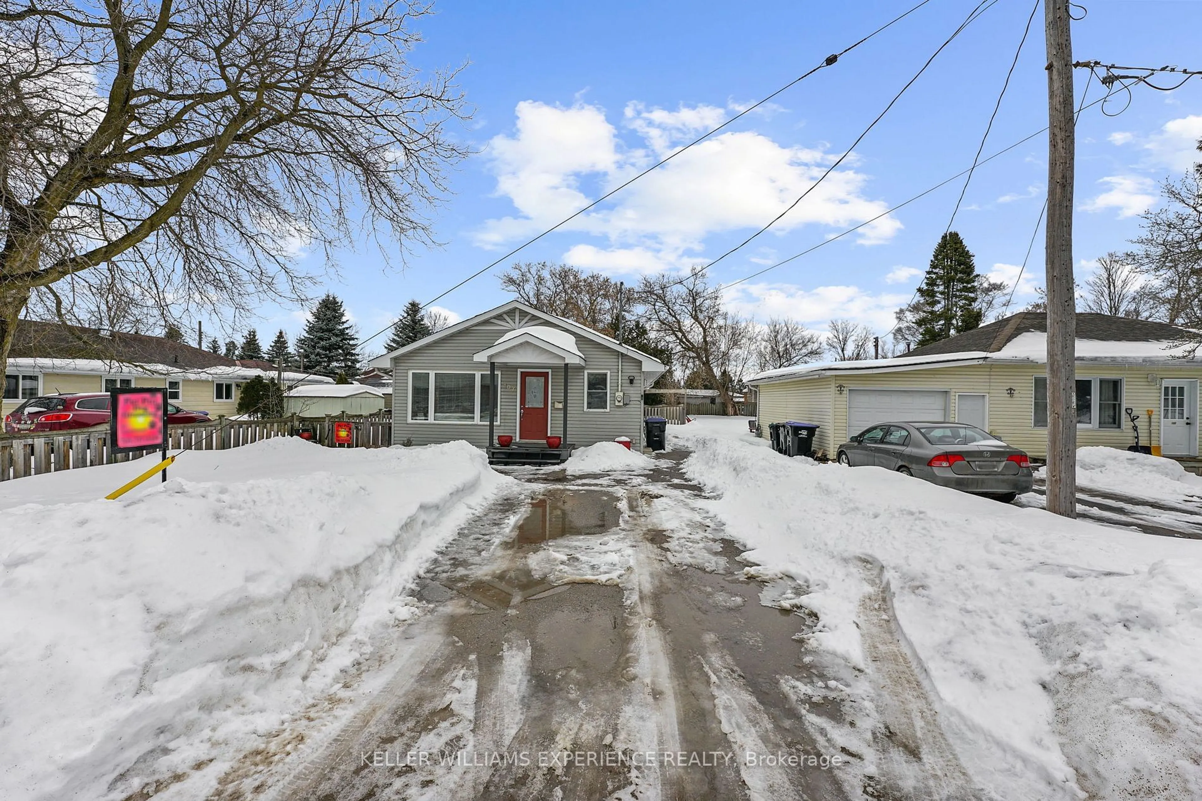 A pic from outside/outdoor area/front of a property/back of a property/a pic from drone, street for 107 Sydenham St, Essa Ontario L0M 1B0