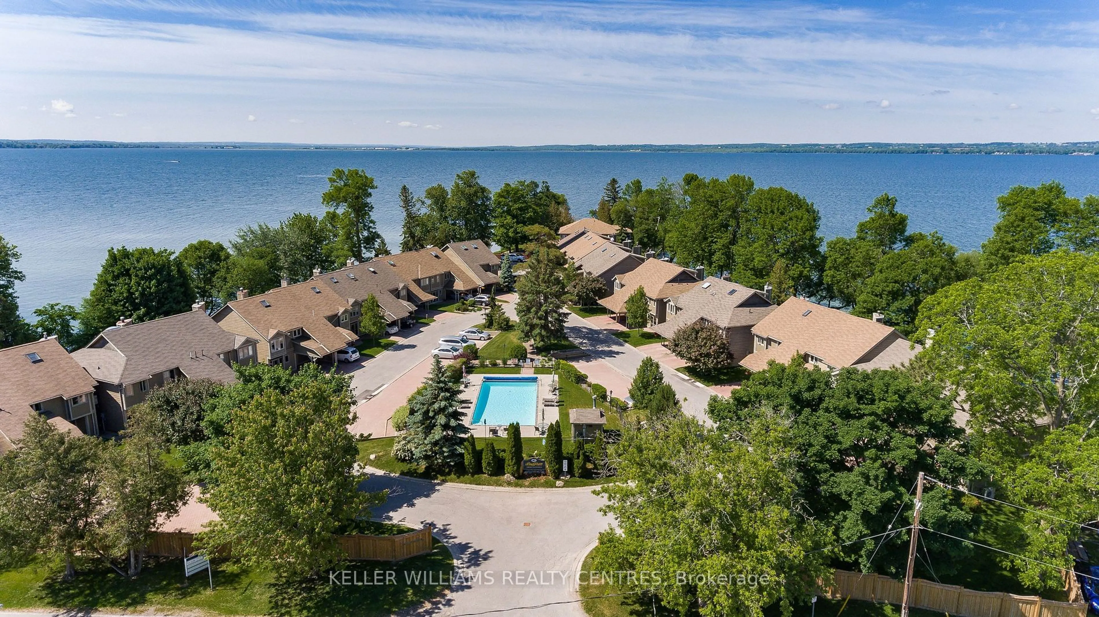 A pic from outside/outdoor area/front of a property/back of a property/a pic from drone, water/lake/river/ocean view for 17 Davy Point Circ, Georgina Ontario L4P 3H2