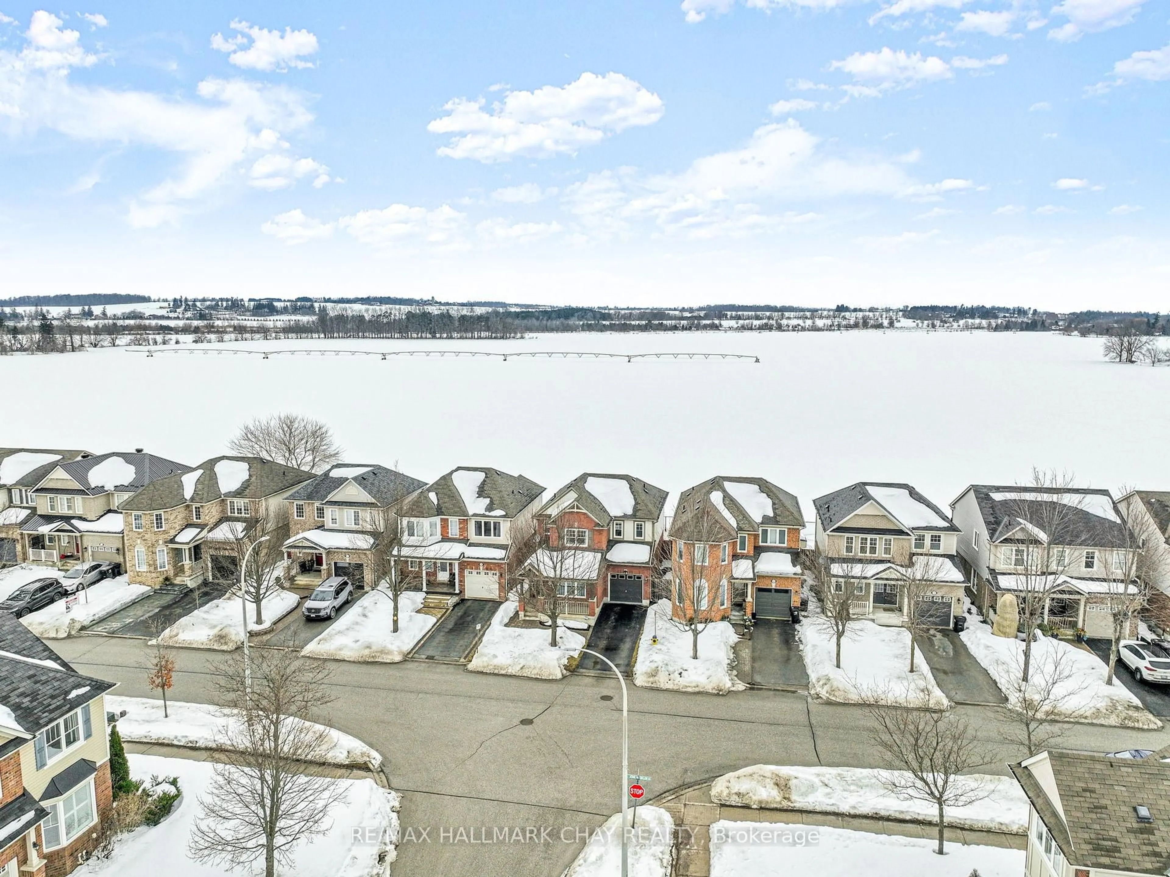 A pic from outside/outdoor area/front of a property/back of a property/a pic from drone, water/lake/river/ocean view for 62 John W Taylor Ave, New Tecumseth Ontario L9R 0E1