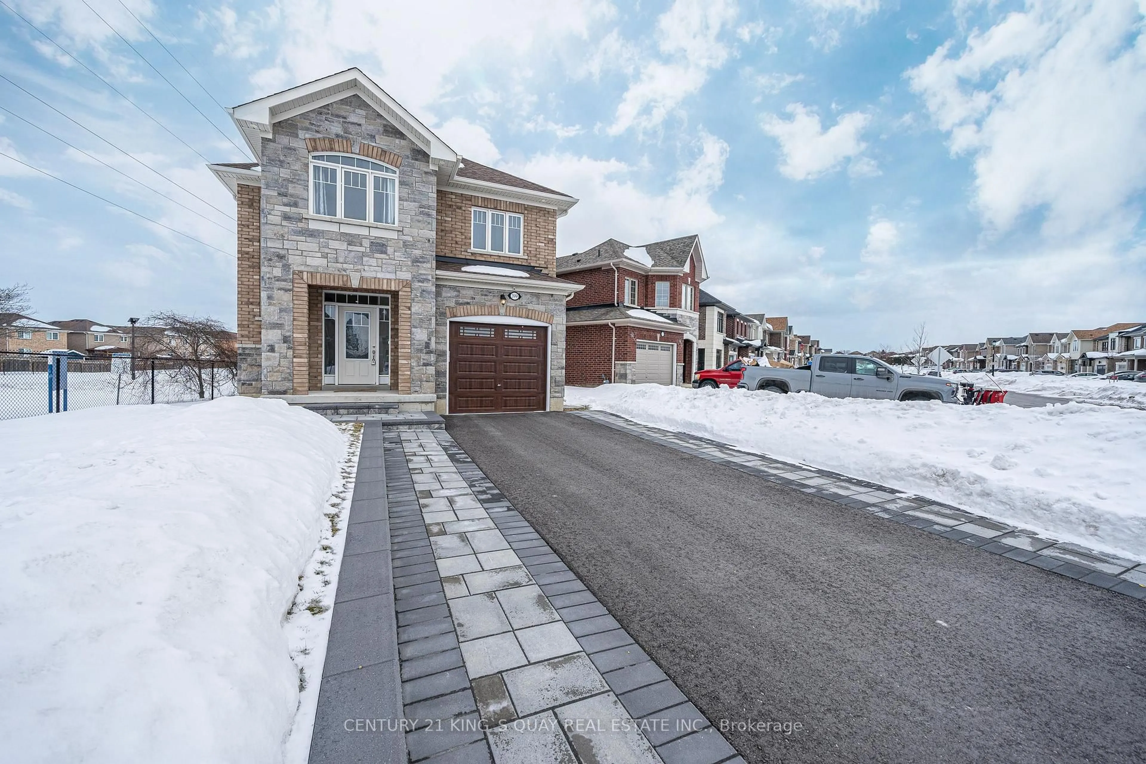 Home with brick exterior material, street for 399 Rita's Ave, Newmarket Ontario L3X 2N1