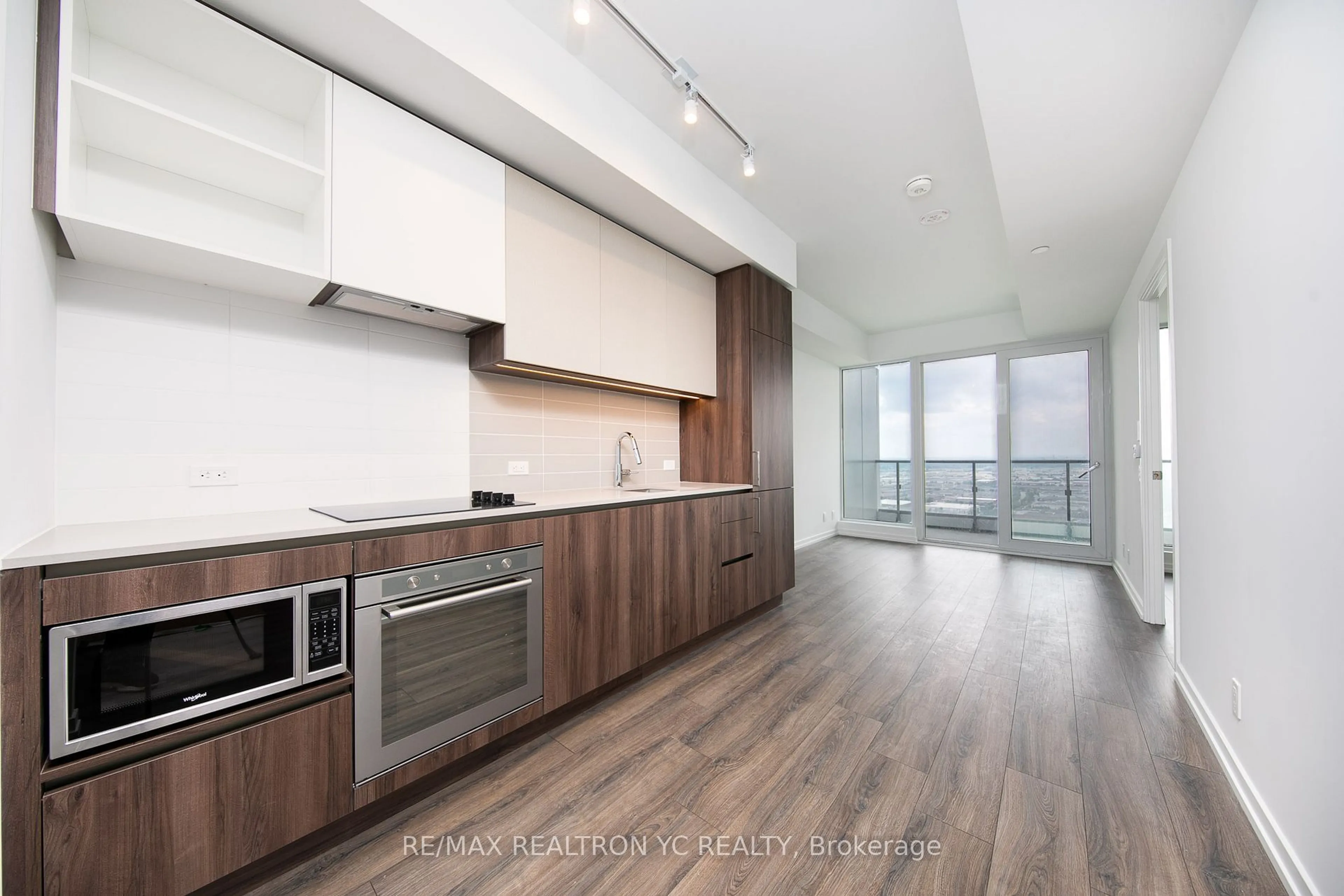 Open concept kitchen, wood/laminate floor for 7890 Jane St #3308, Vaughan Ontario L4K 0K9