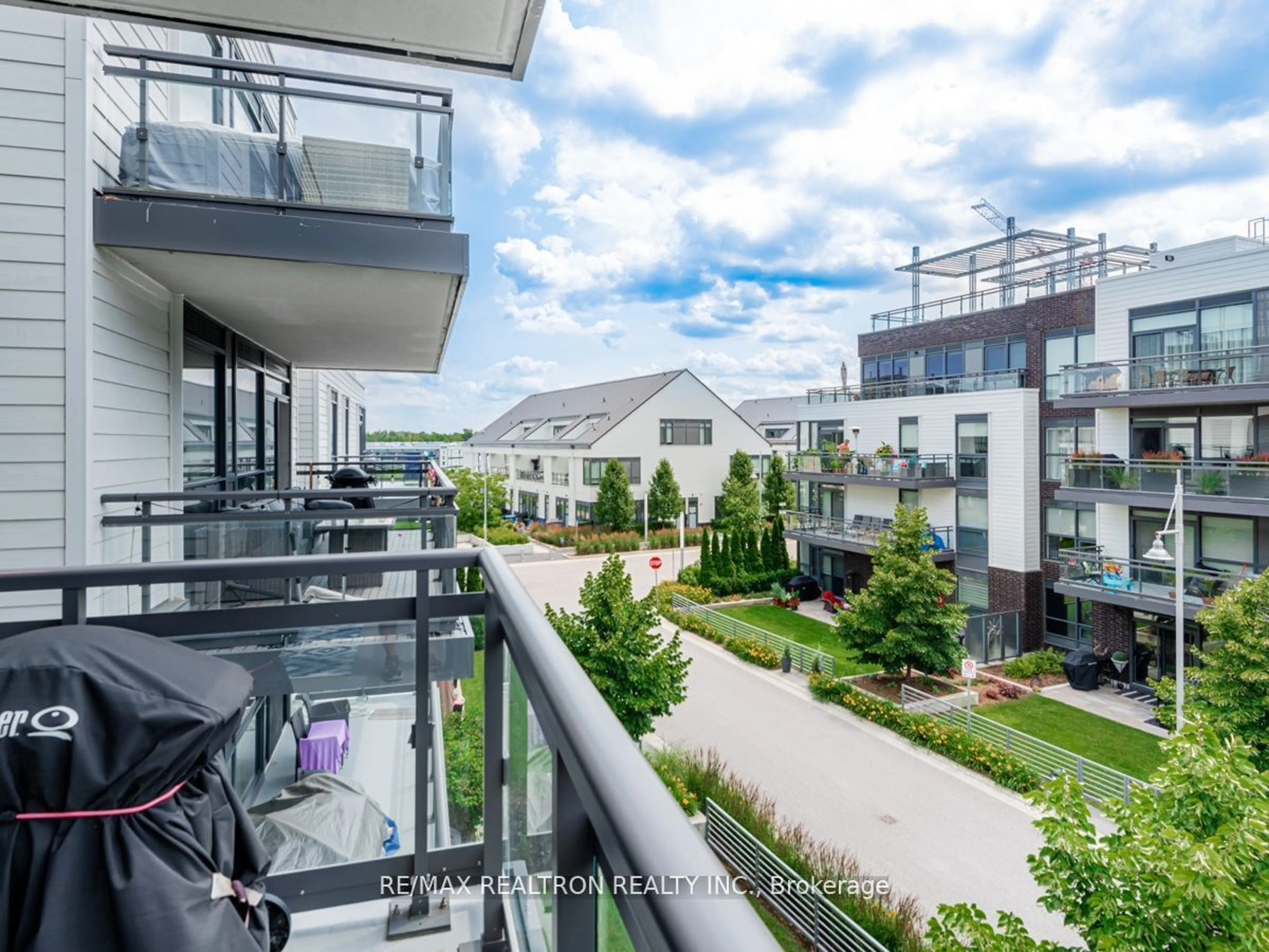 Balcony in the apartment, city buildings view from balcony for 301 Sea Ray Ave #C311, Innisfil Ontario L9S 0L8
